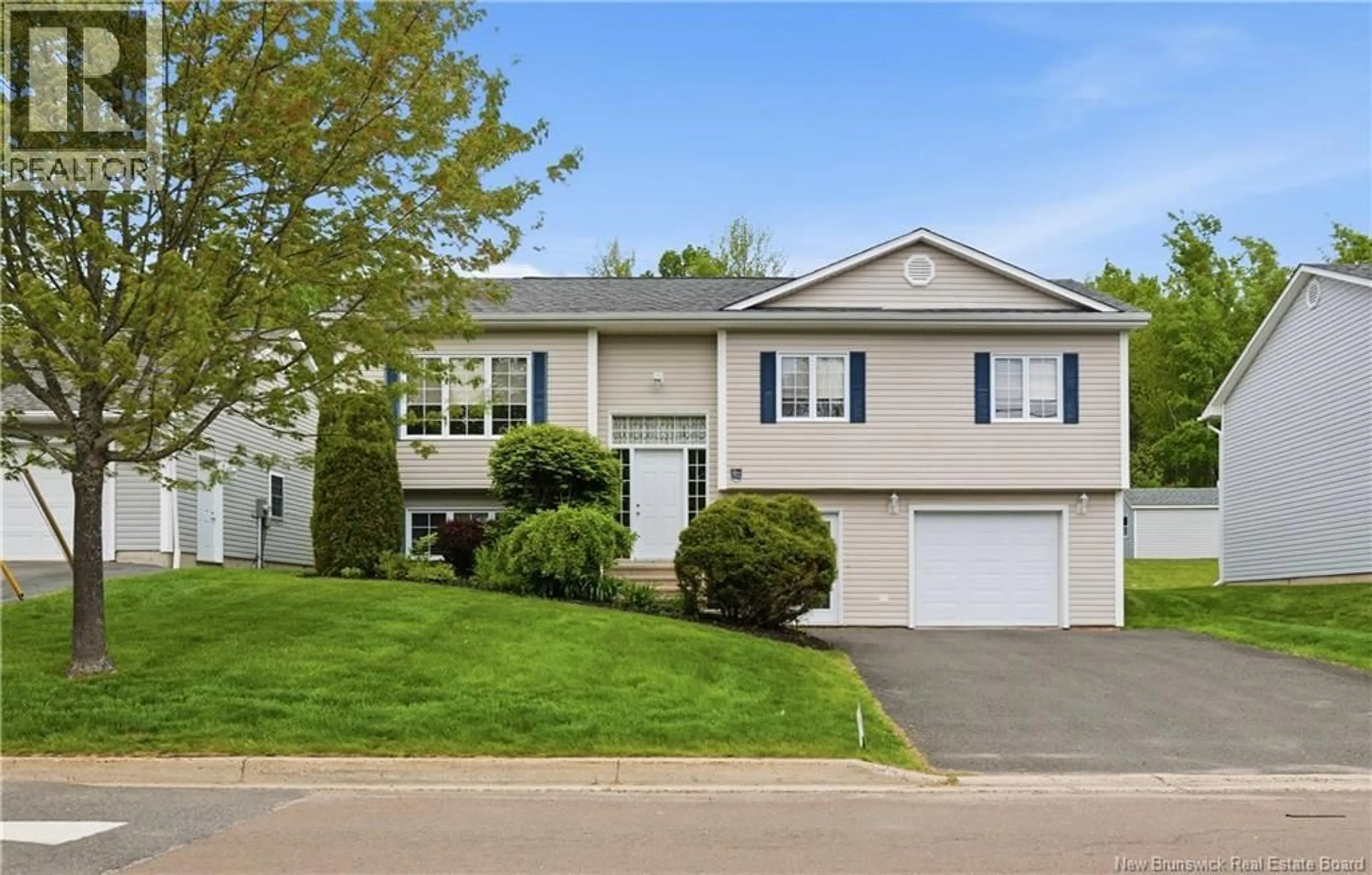 Home with vinyl exterior material, street for 92 MCGIBBON STREET, Fredericton New Brunswick E3B9S2