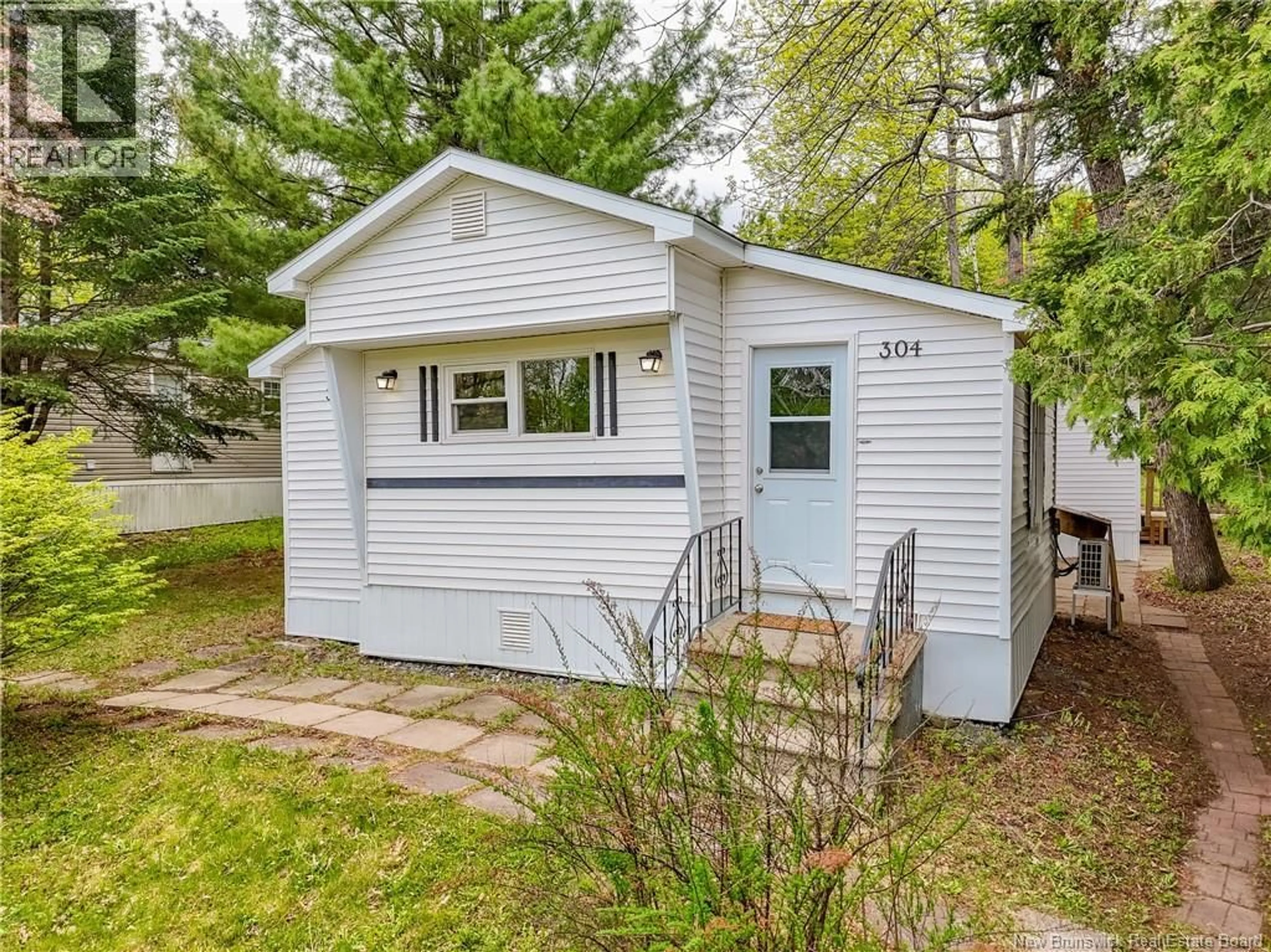 Home with vinyl exterior material, street for 304 GOVERNOR LANE, Fredericton New Brunswick E3B7K9
