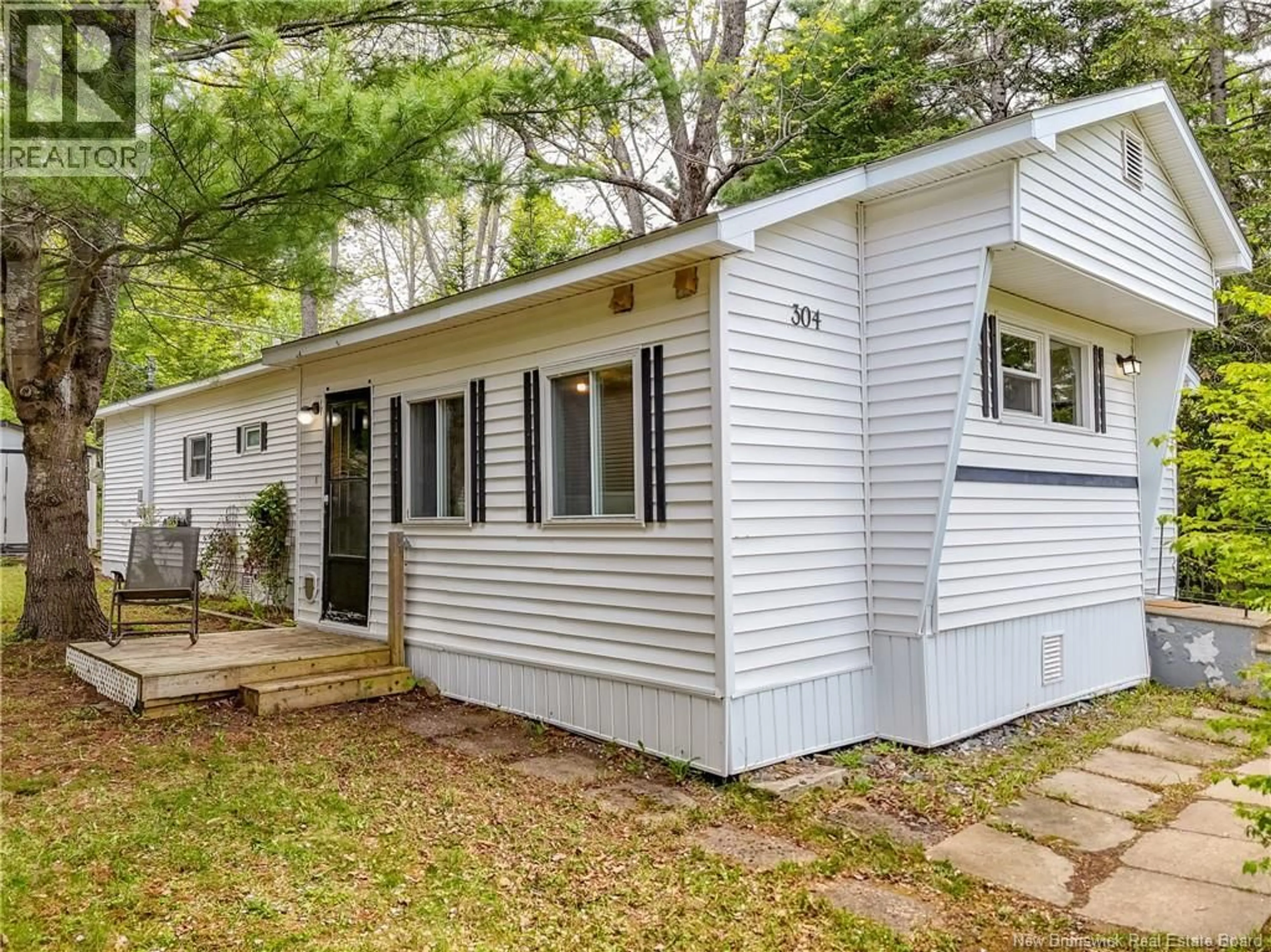 Home with vinyl exterior material, street for 304 GOVERNOR LANE, Fredericton New Brunswick E3B7K9