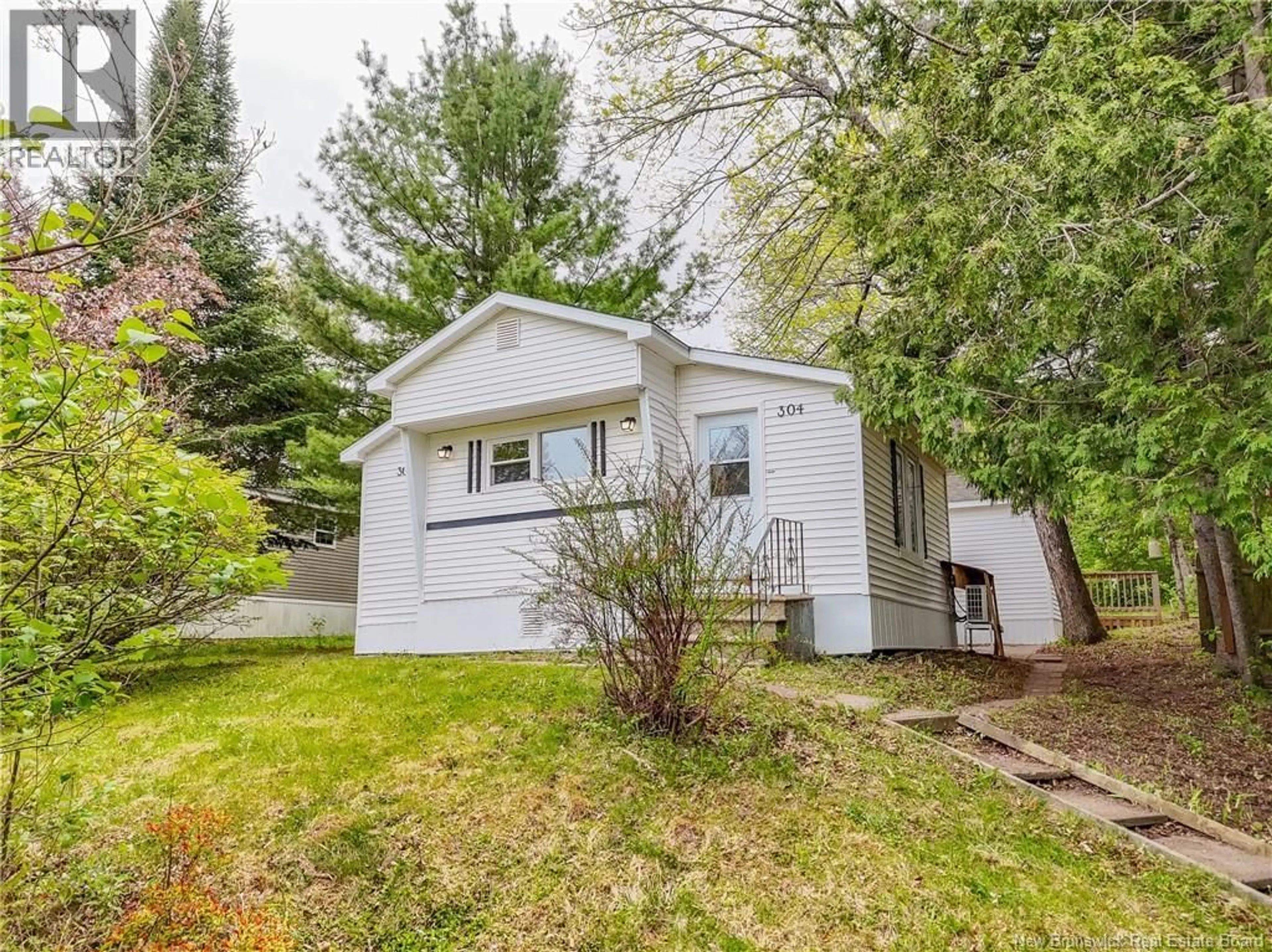 Home with vinyl exterior material, street for 304 GOVERNOR LANE, Fredericton New Brunswick E3B7K9