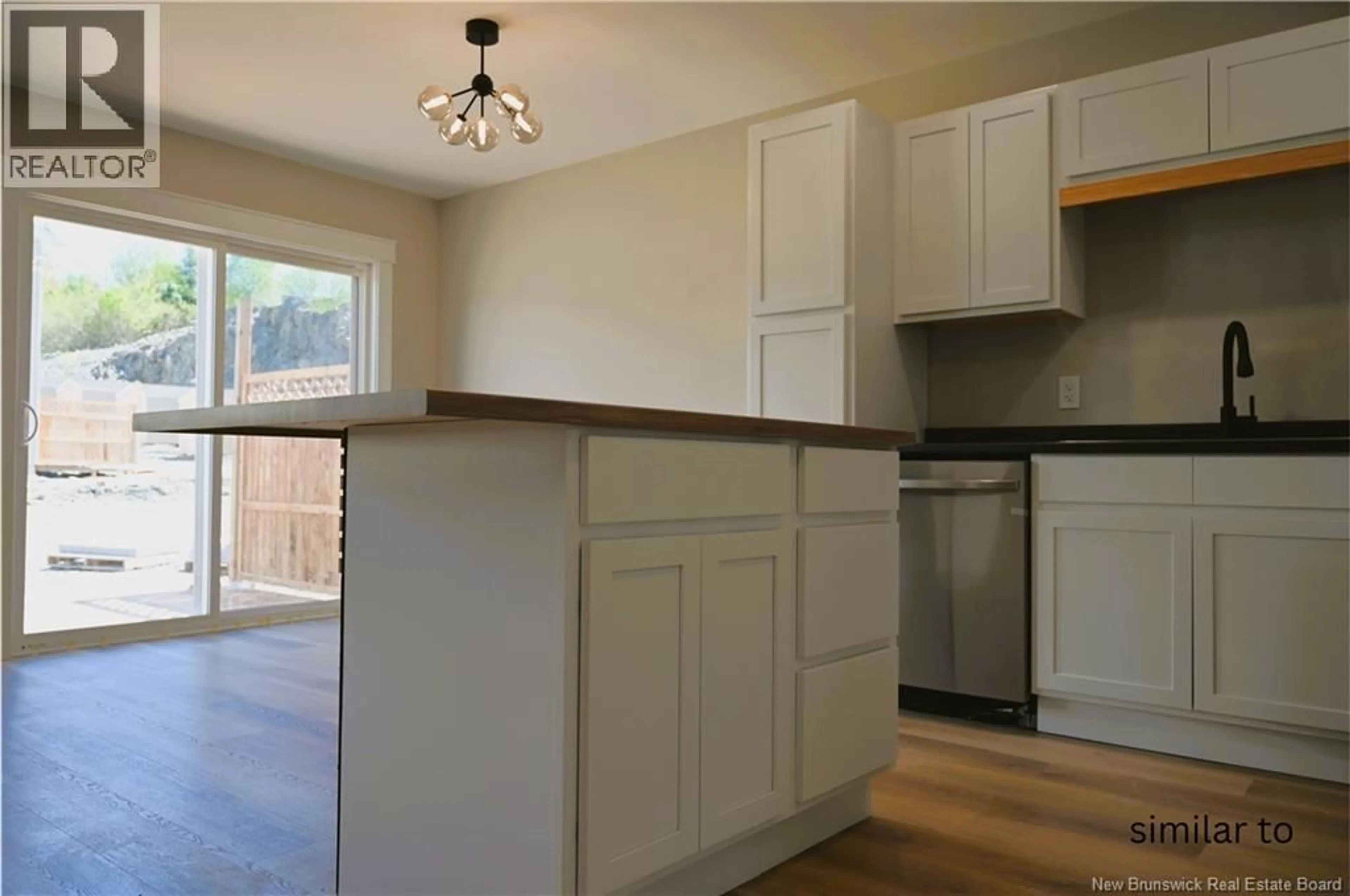 Open concept kitchen, wood/laminate floor for 29 ARLINGTON CRESCENT, Saint John New Brunswick E2K0G4