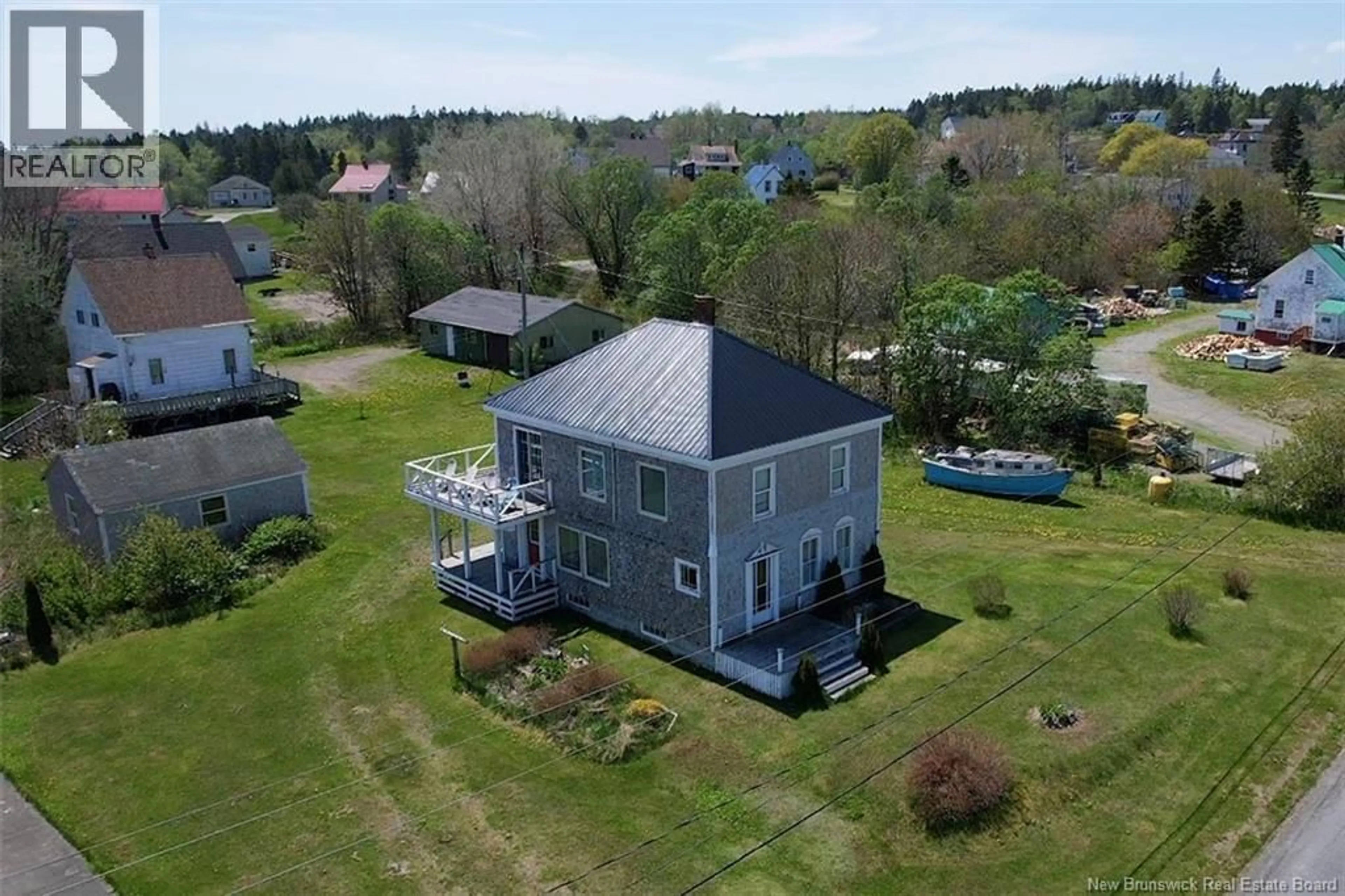 A pic from outside/outdoor area/front of a property/back of a property/a pic from drone, building for 12 SC BREAKWATER, Grand Manan New Brunswick E5G2J2