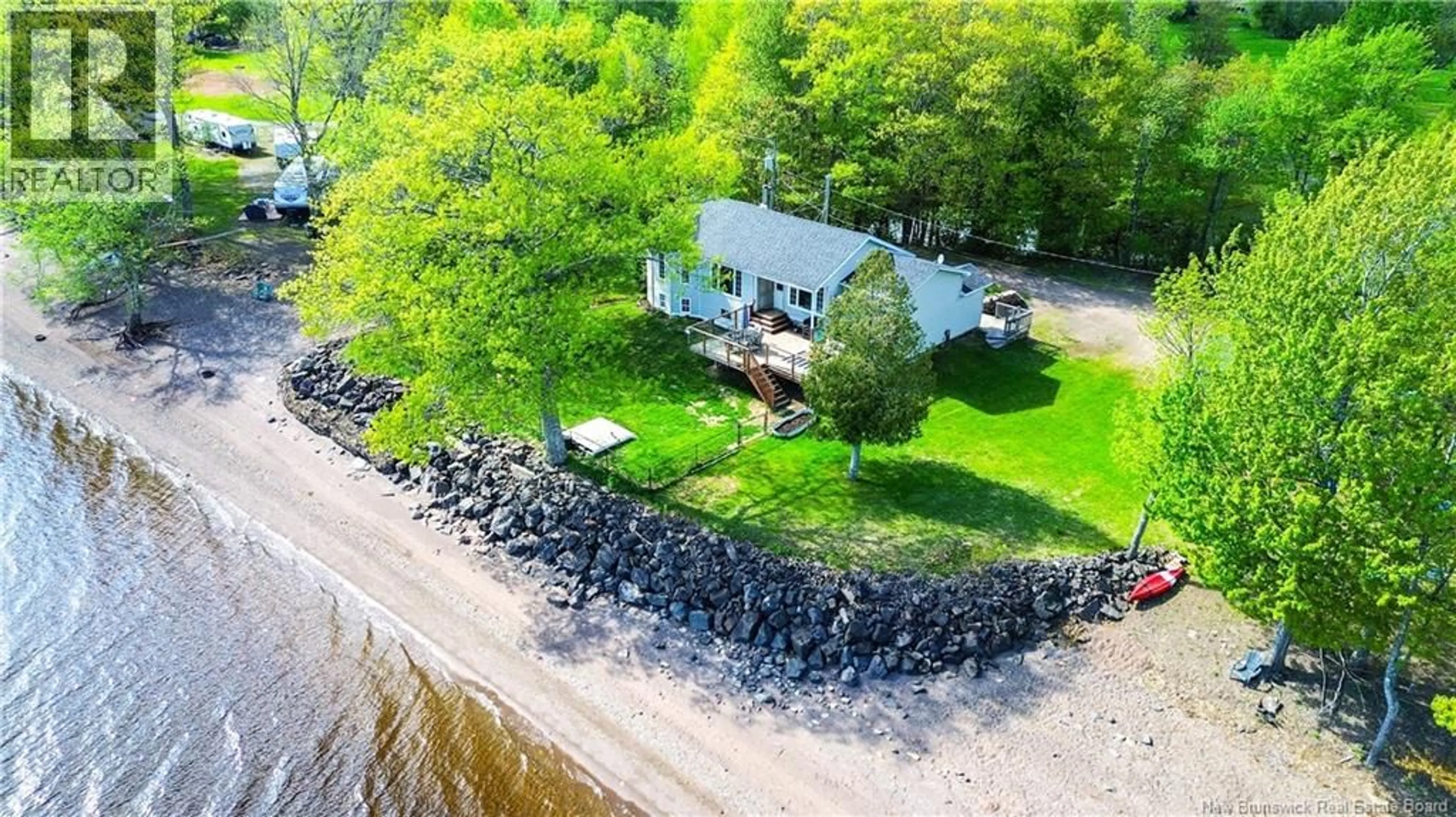 A pic from outside/outdoor area/front of a property/back of a property/a pic from drone, water/lake/river/ocean view for 27 GRANDVIEW LANE, Grand Lake New Brunswick E4B1X7