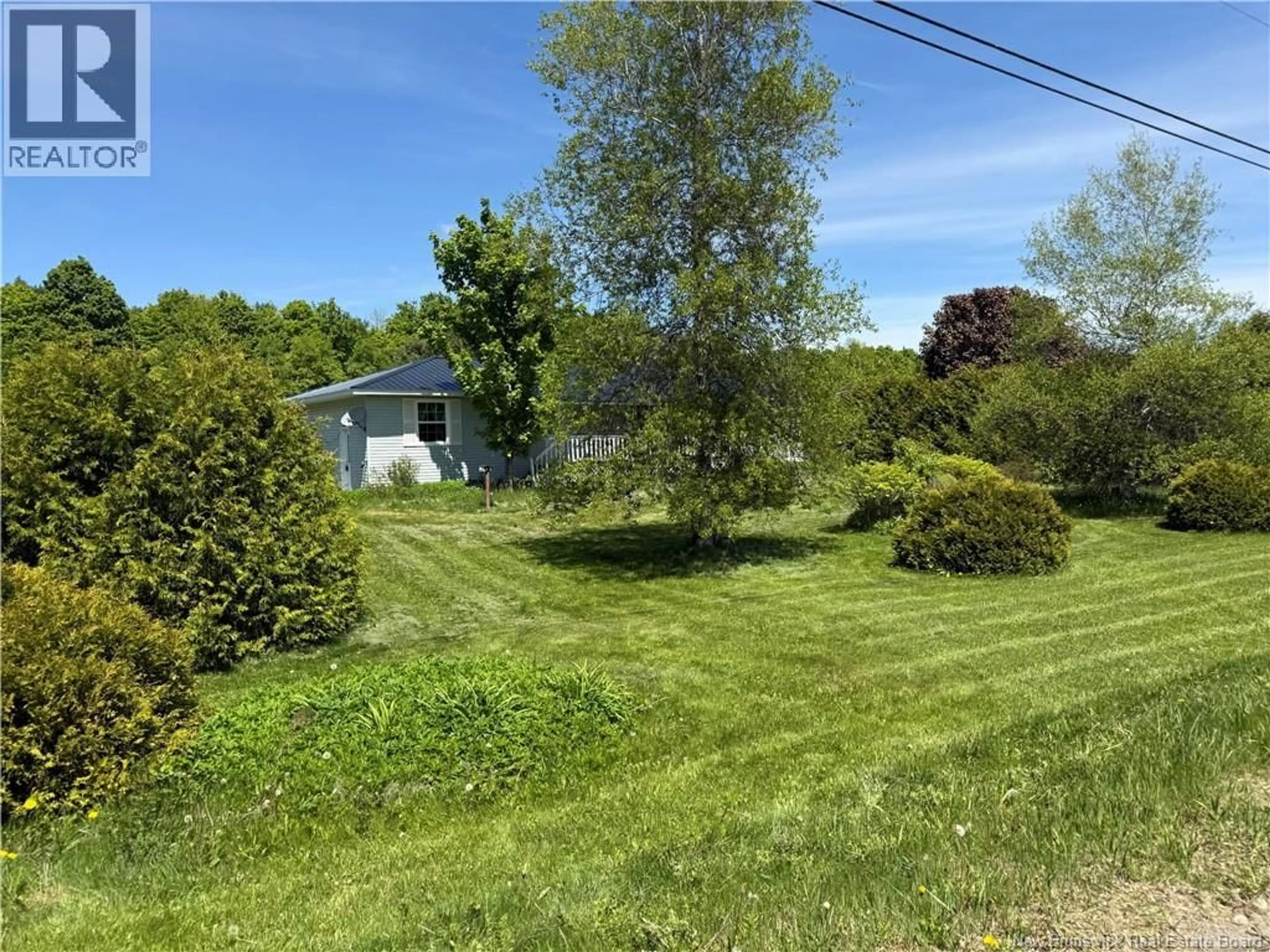 A pic from outside/outdoor area/front of a property/back of a property/a pic from drone, water/lake/river/ocean view for 988 ROUTE 555, Richmond Settlement New Brunswick E7M4X6