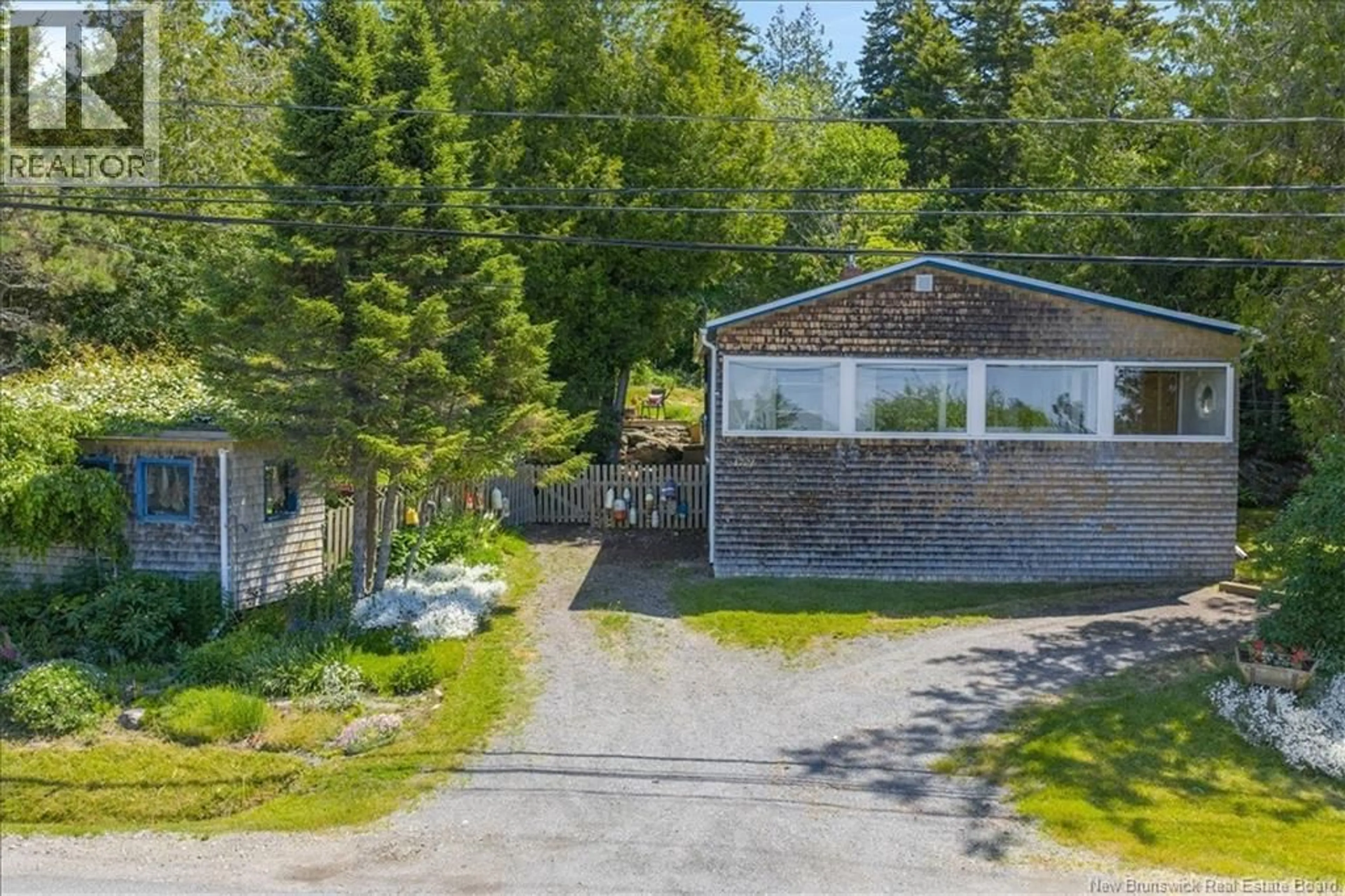 A pic from outside/outdoor area/front of a property/back of a property/a pic from drone, unknown for 1721 RED HEAD ROAD, Saint John New Brunswick E2P1K5