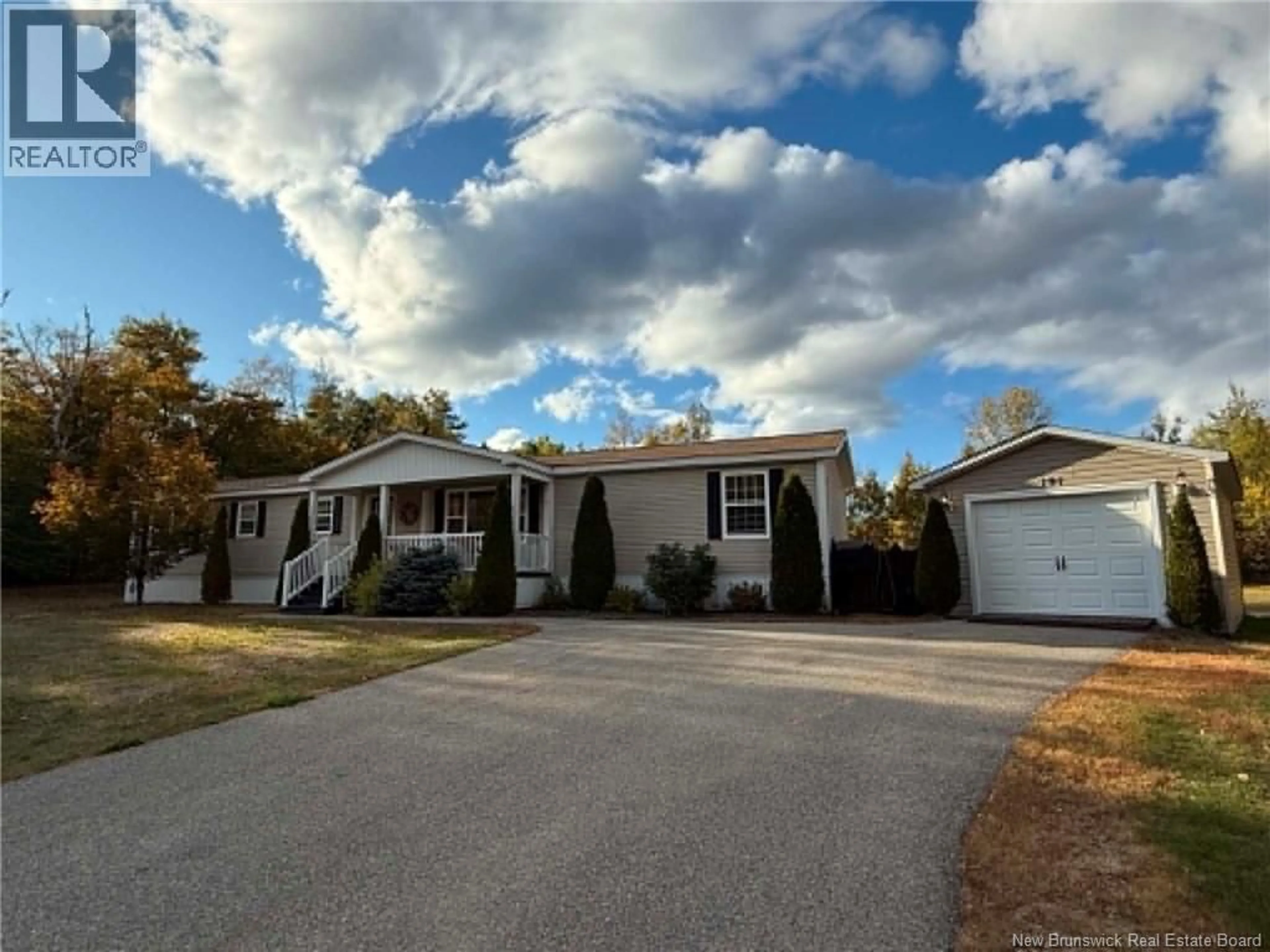 Home with vinyl exterior material, street for 101 MCKINNON ROAD, Miramichi New Brunswick E1V5Y5