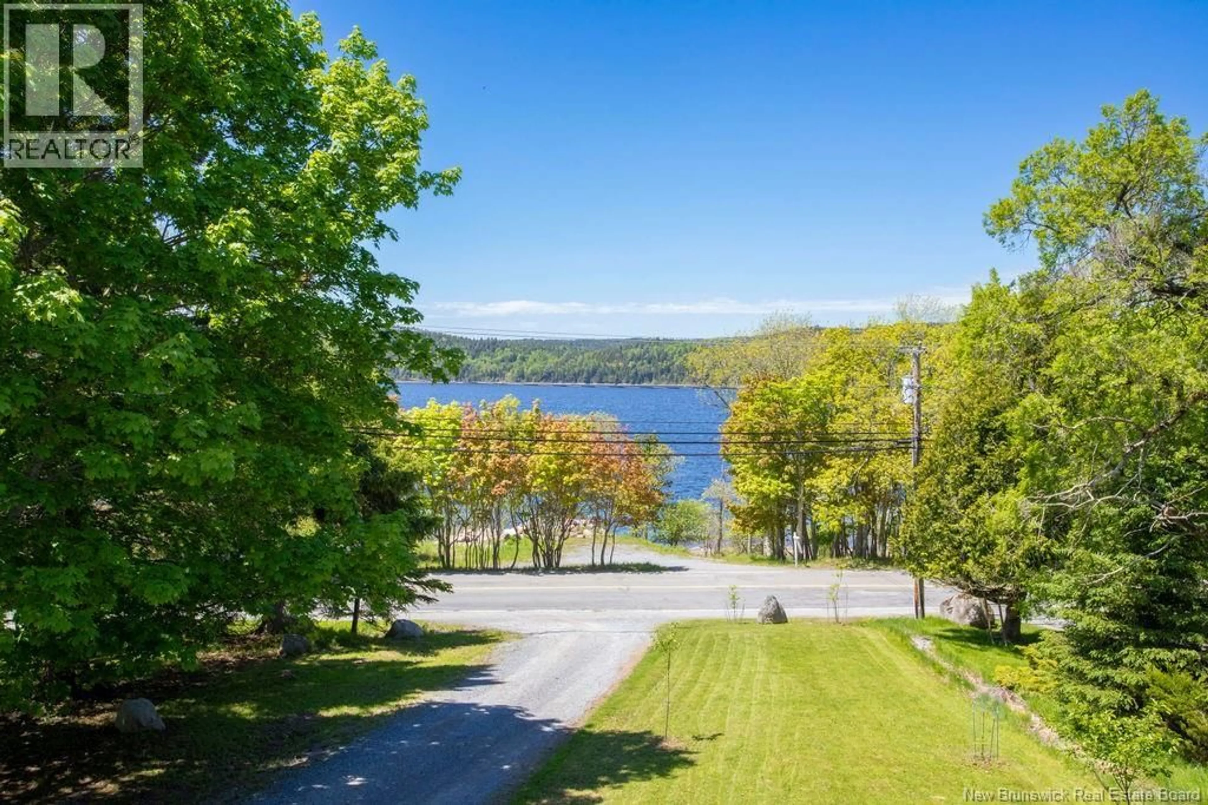 A pic from outside/outdoor area/front of a property/back of a property/a pic from drone, water/lake/river/ocean view for 488 GONDOLA POINT ROAD, Quispamsis New Brunswick E2E1E2