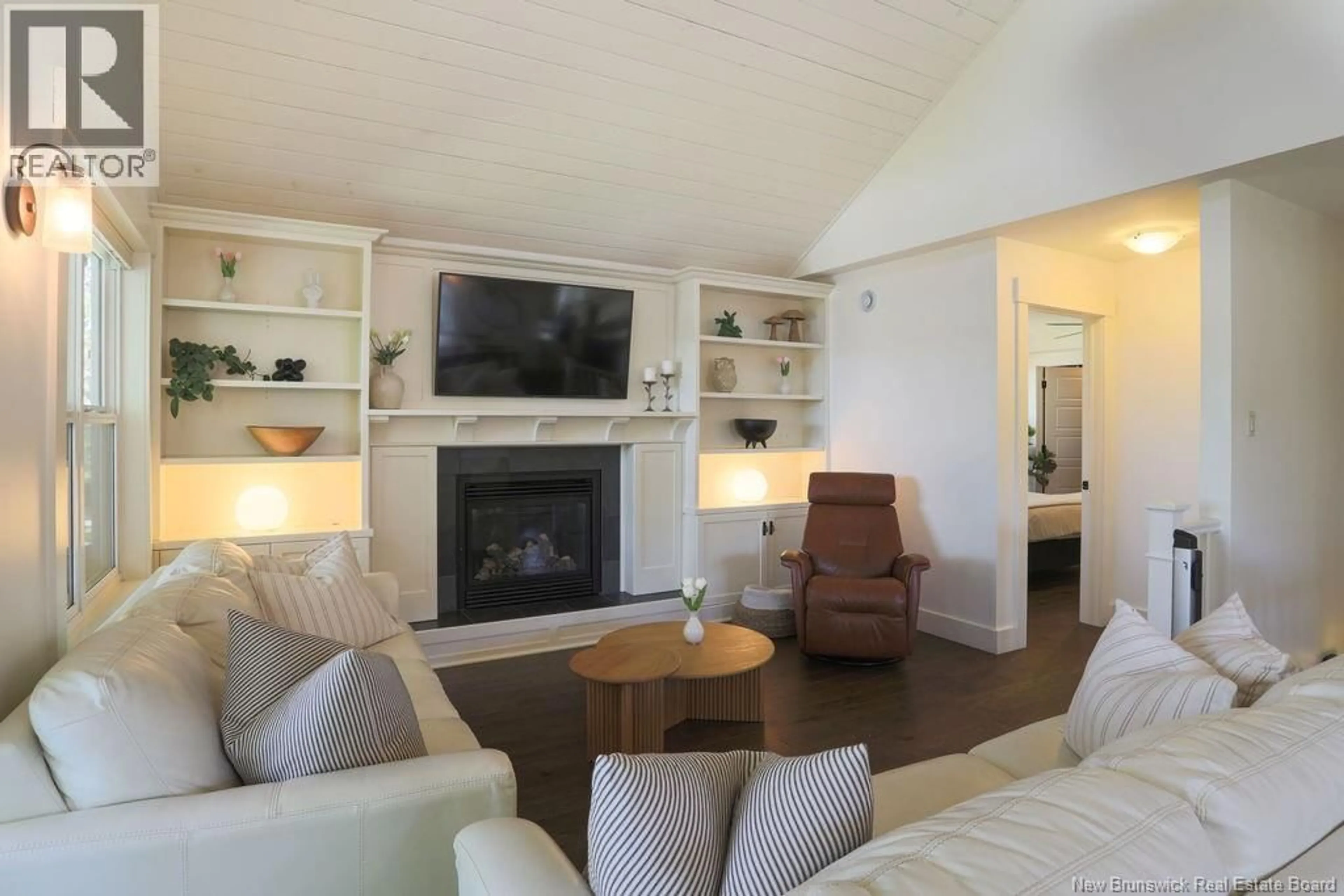 Living room with furniture, wood/laminate floor for 488 GONDOLA POINT ROAD, Quispamsis New Brunswick E2E1E2
