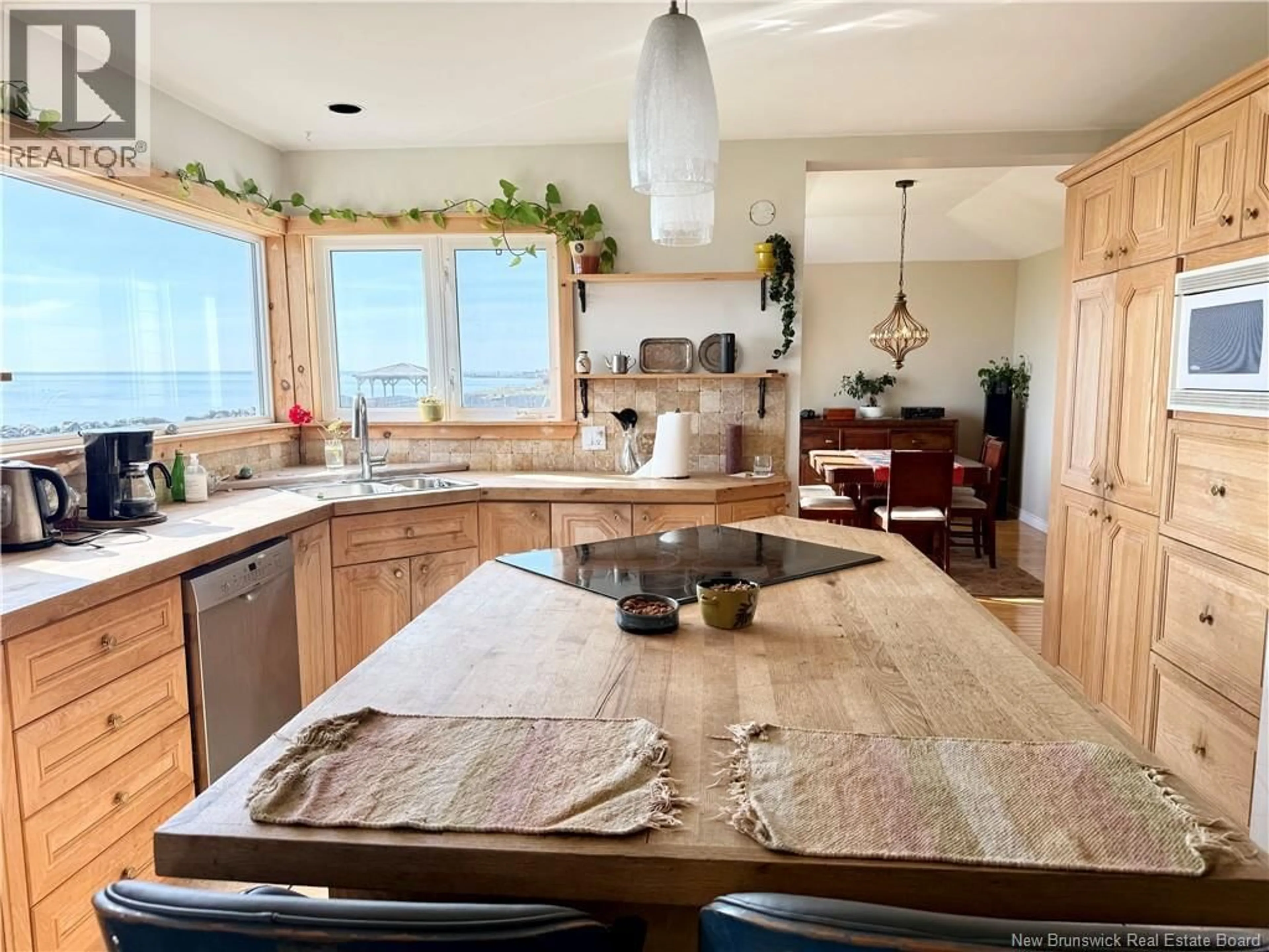 Open concept kitchen, ceramic/tile floor for 411 PRINCIPALE, Petit-Rocher New Brunswick E8J1L9
