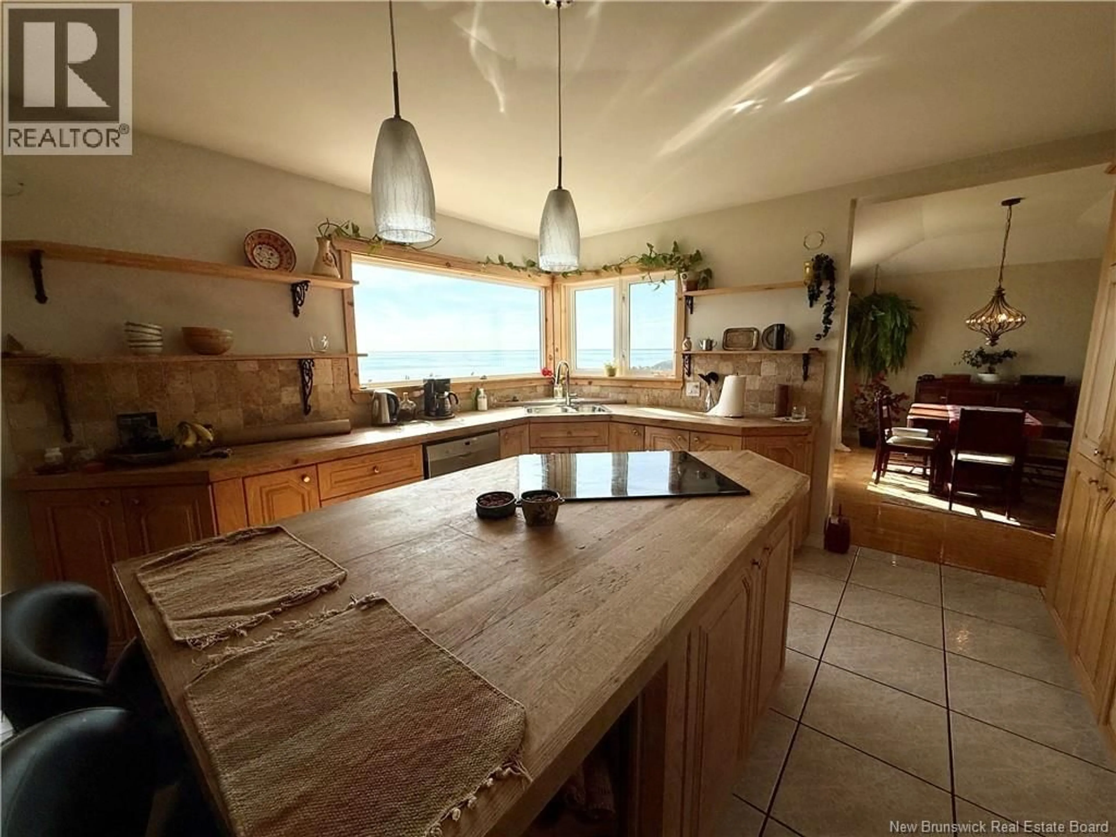 Open concept kitchen, ceramic/tile floor for 411 PRINCIPALE, Petit-Rocher New Brunswick E8J1L9