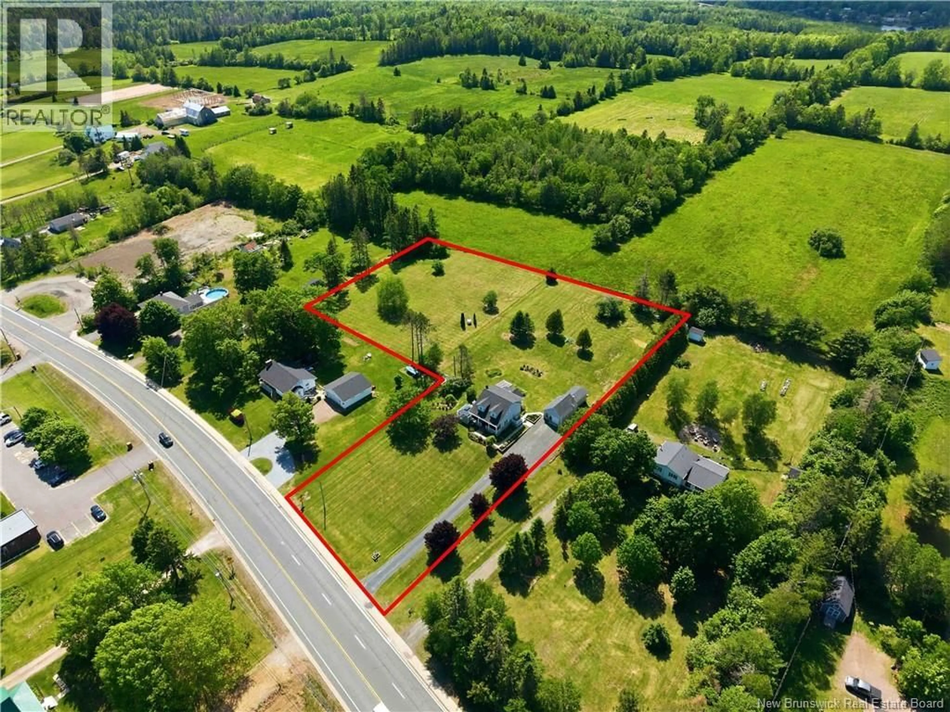 A pic from outside/outdoor area/front of a property/back of a property/a pic from drone, street for 2010 ROUTE 3, Harvey New Brunswick E6K3E9