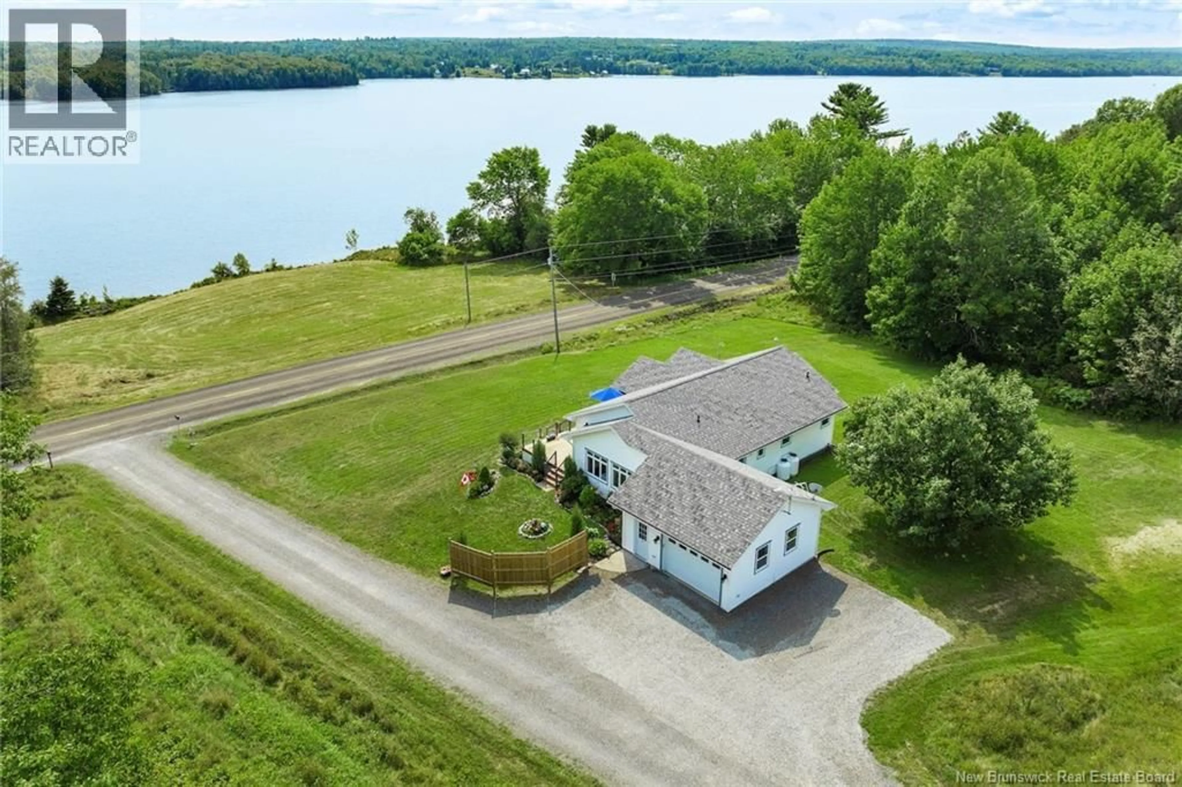 A pic from outside/outdoor area/front of a property/back of a property/a pic from drone, water/lake/river/ocean view for 2446 ROUTE 105, Lower Queensbury New Brunswick E6L1G2