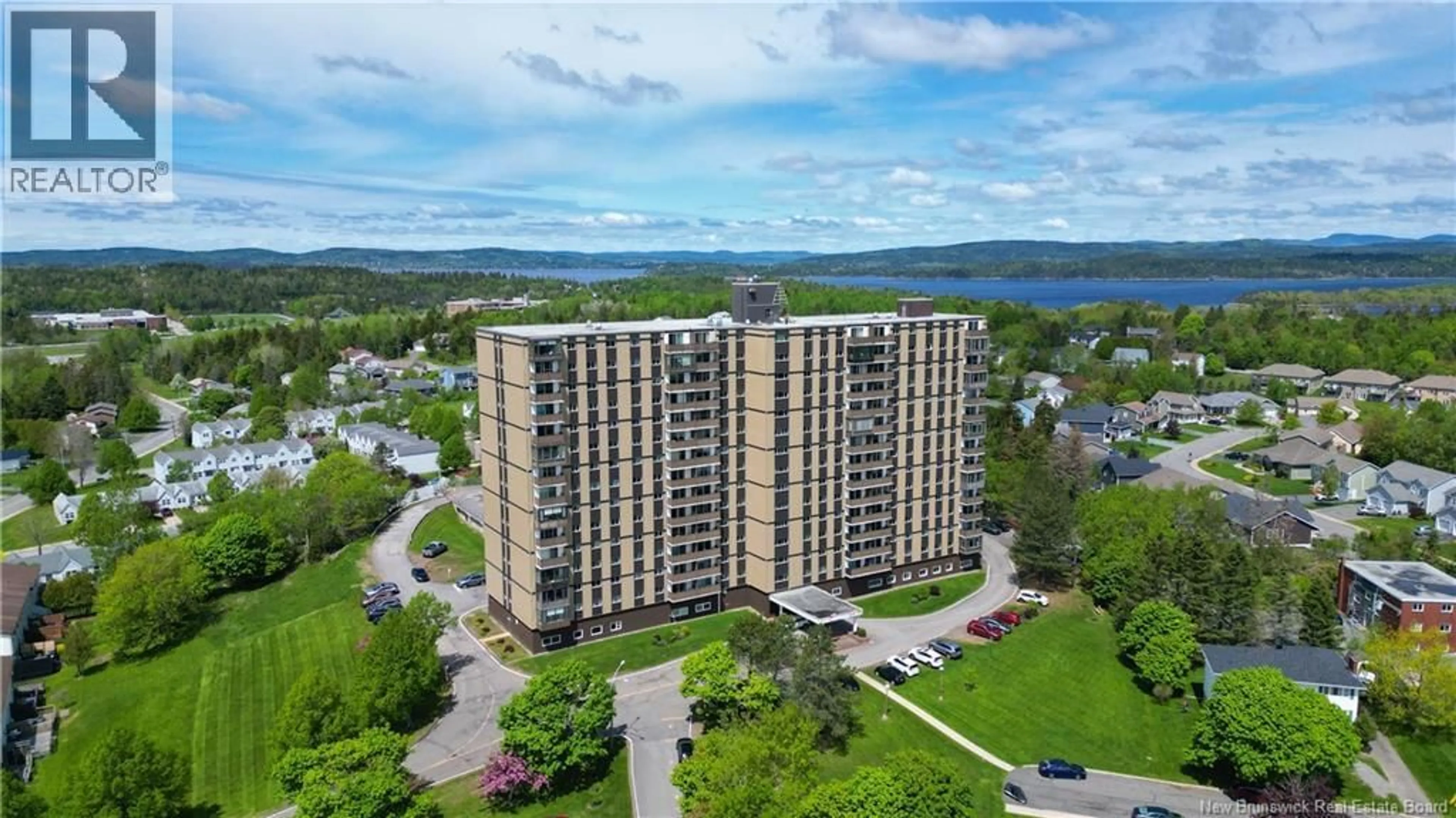 A pic from outside/outdoor area/front of a property/back of a property/a pic from drone, water/lake/river/ocean view for 702 - 310 WOODWARD AVENUE, Saint John New Brunswick E2K2L1