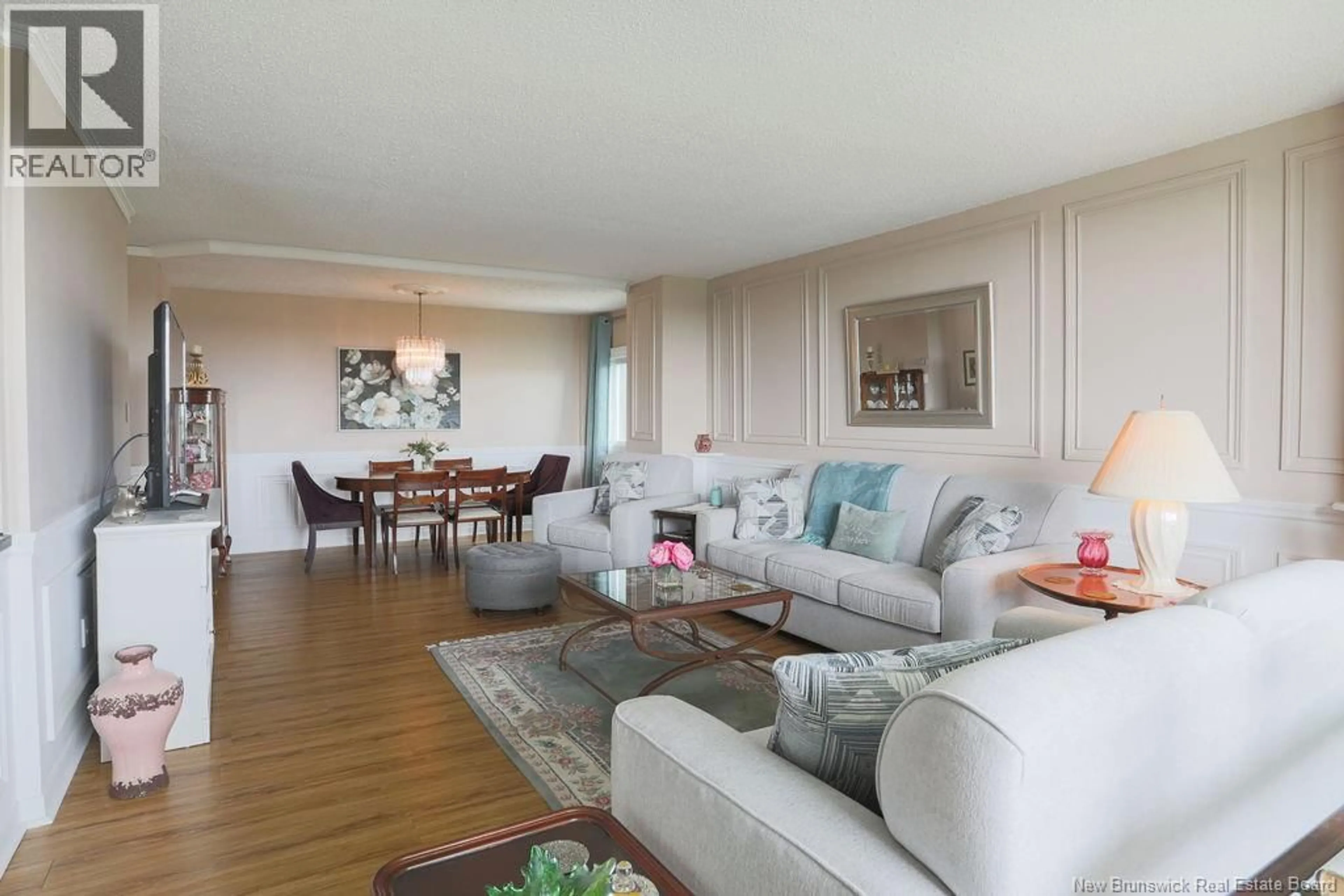Living room with furniture, wood/laminate floor for 702 - 310 WOODWARD AVENUE, Saint John New Brunswick E2K2L1
