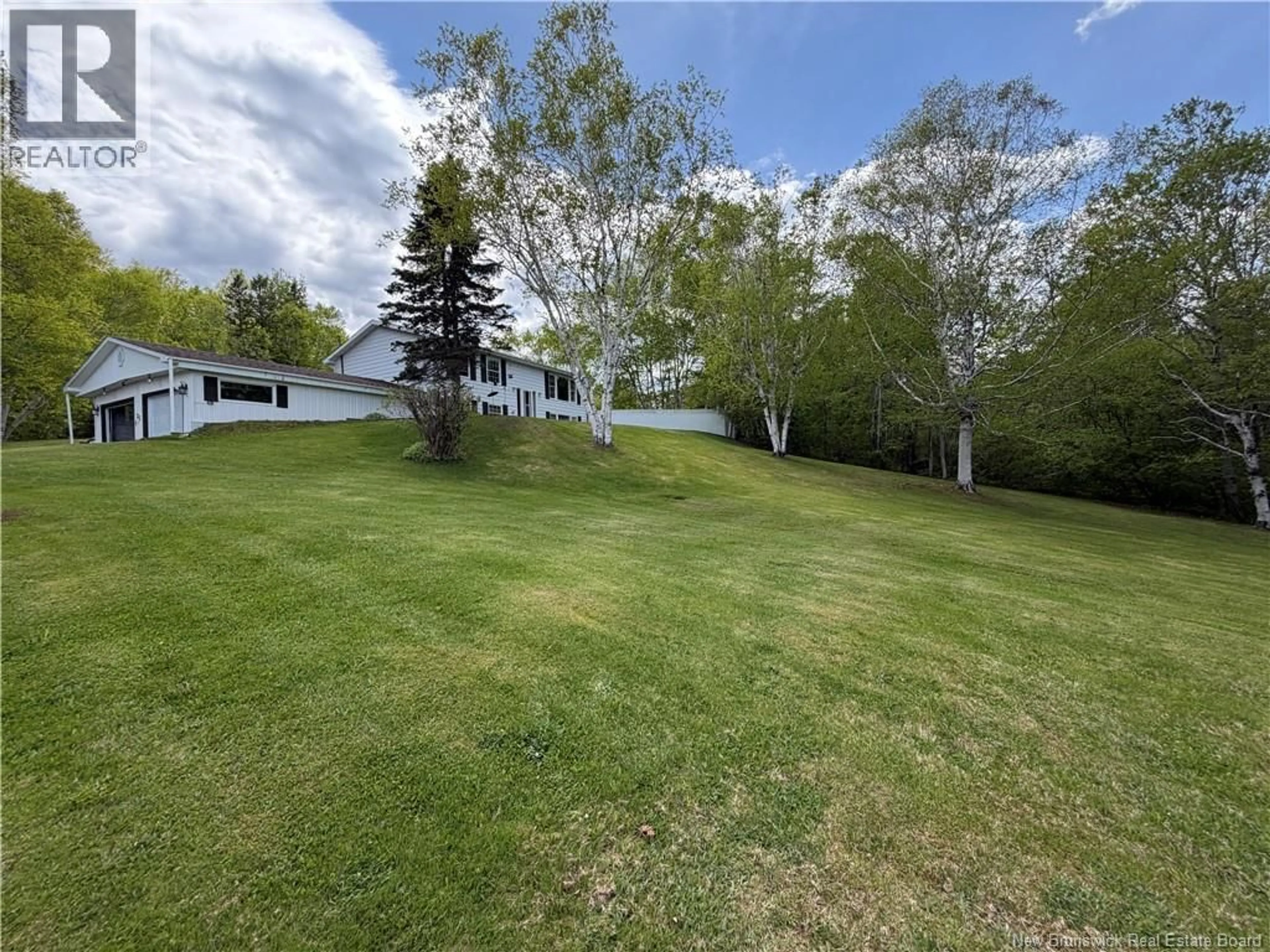 A pic from outside/outdoor area/front of a property/back of a property/a pic from drone, unknown for 25 MCNEISH ROAD, Point La Nim New Brunswick E3N6B8