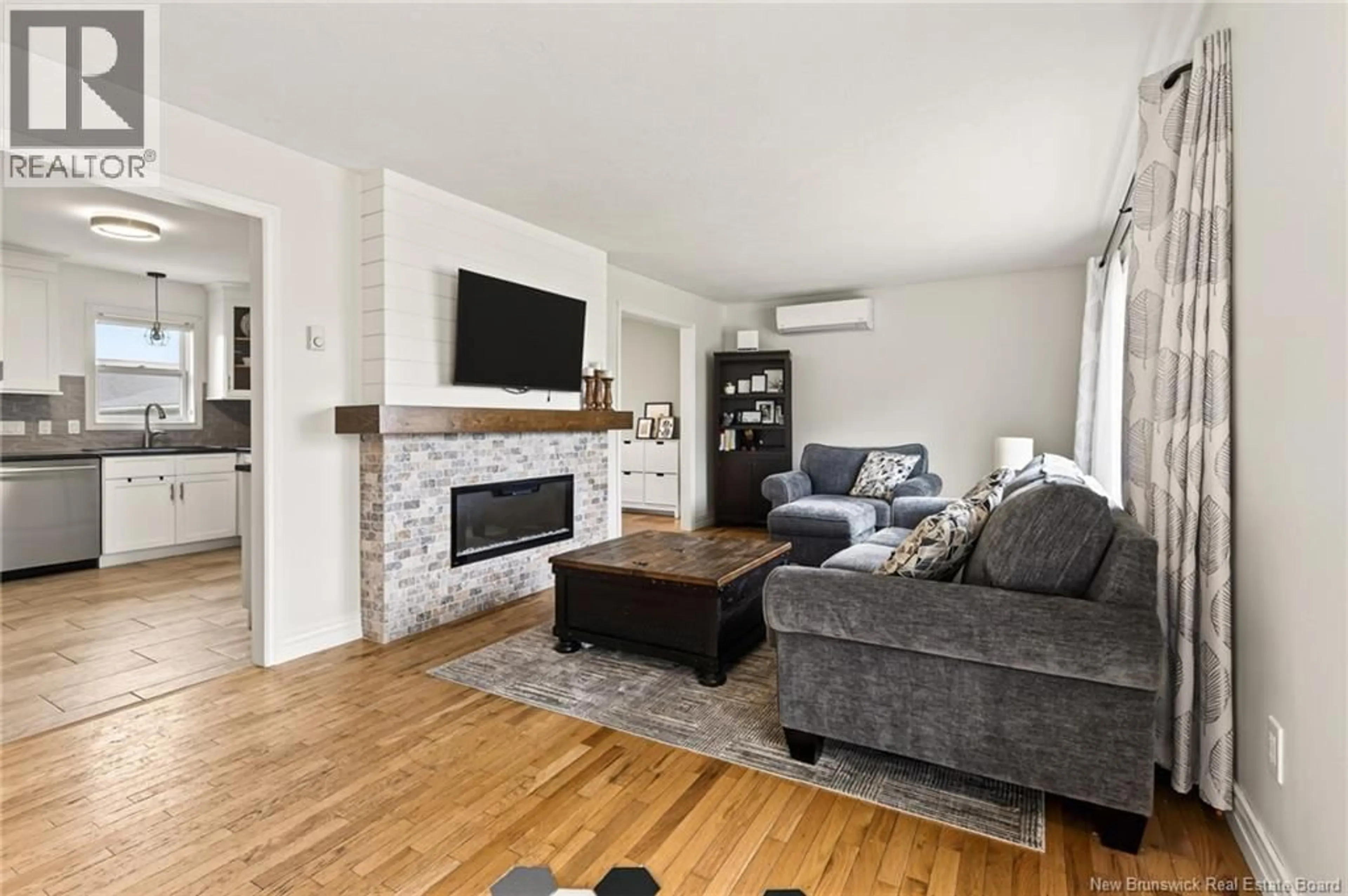 Living room with furniture, wood/laminate floor for 8 GORDON STREET, Salisbury New Brunswick E4J2C5