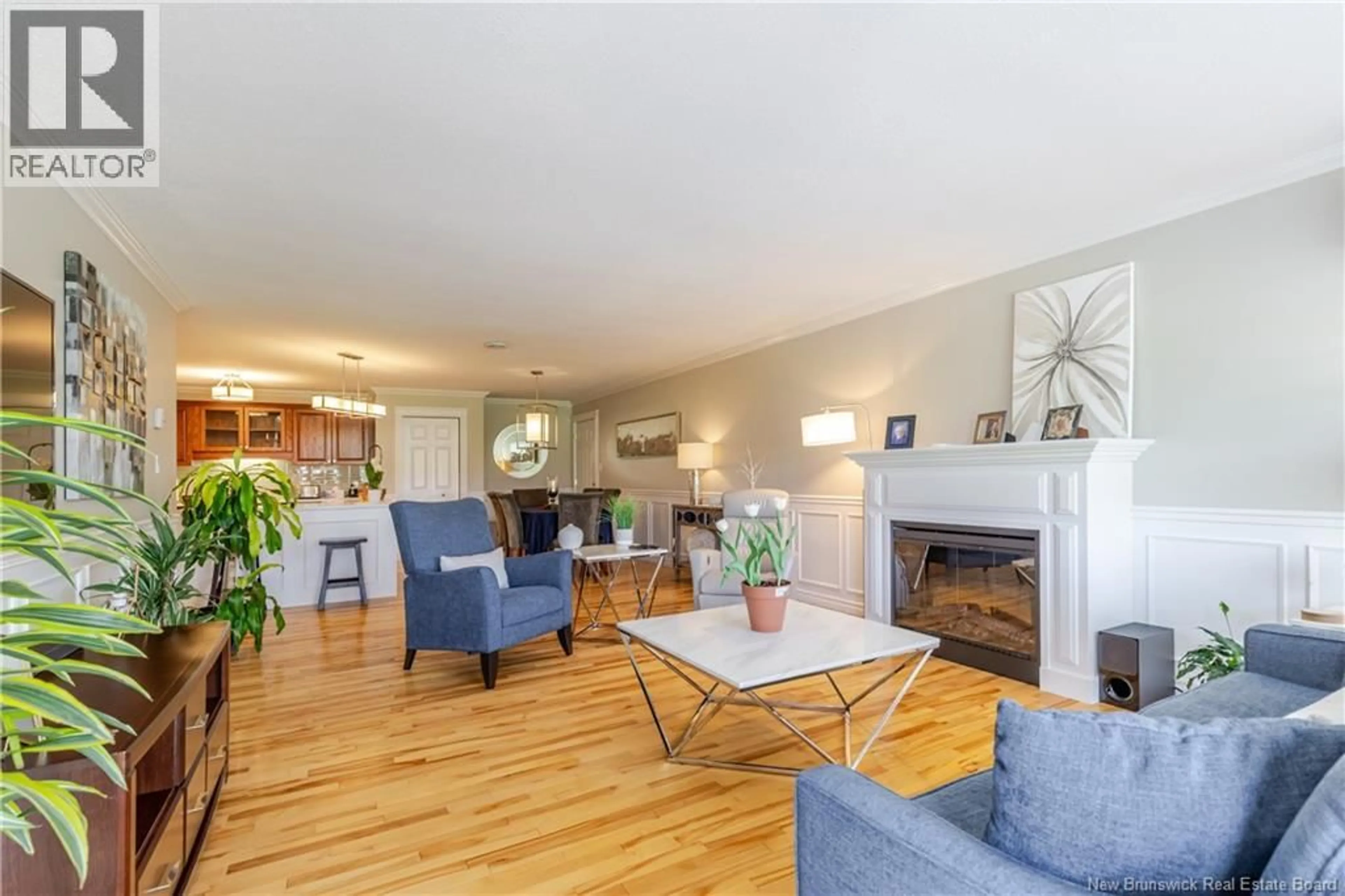 Living room with furniture, wood/laminate floor for 13 - 185 REYNOLDS STREET, Fredericton New Brunswick E3A0K7