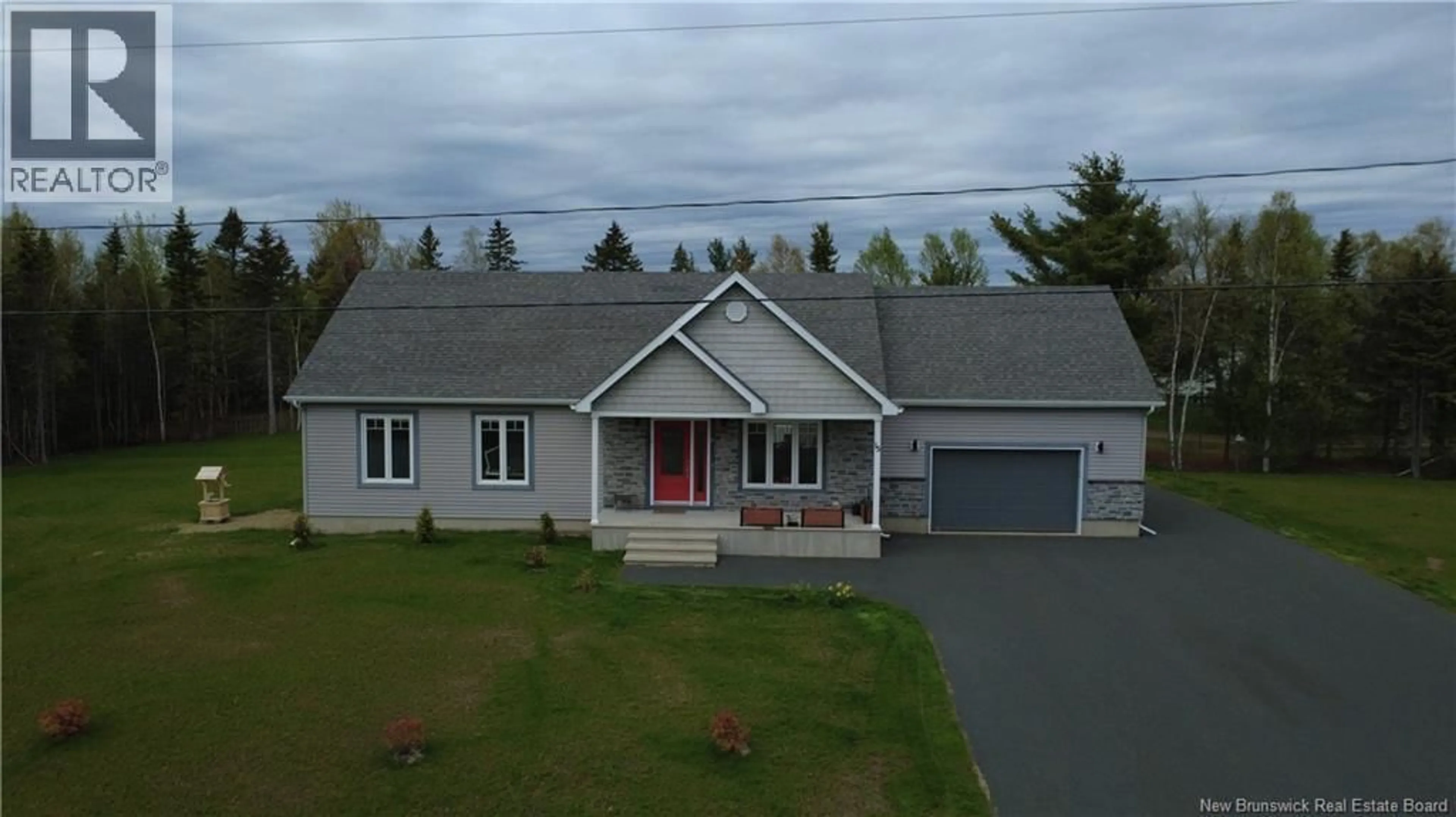 A pic from outside/outdoor area/front of a property/back of a property/a pic from drone, building for 15 RUE GIROUARD, Saumarez New Brunswick E1X3K2