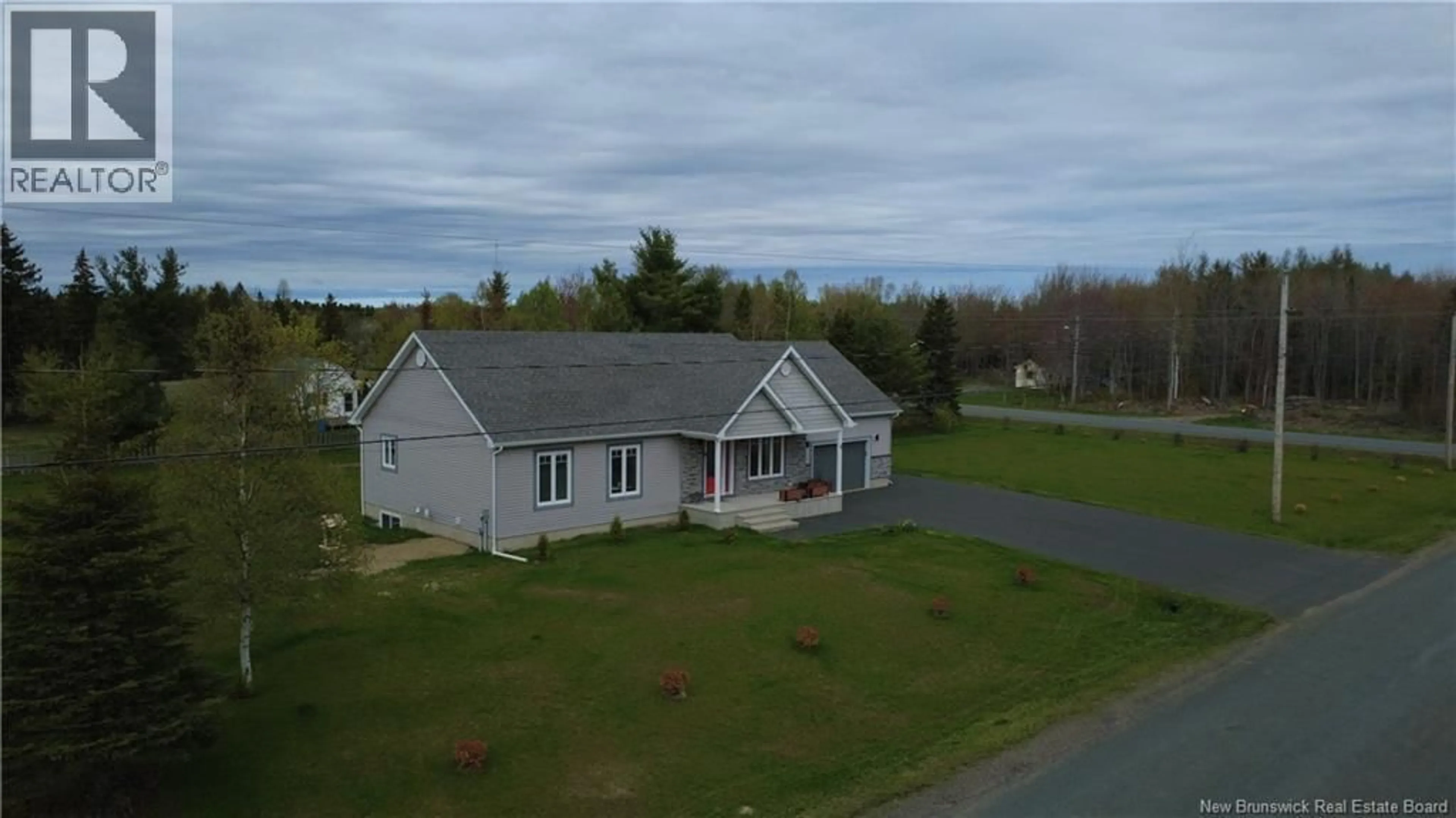 A pic from outside/outdoor area/front of a property/back of a property/a pic from drone, unknown for 15 RUE GIROUARD, Saumarez New Brunswick E1X3K2
