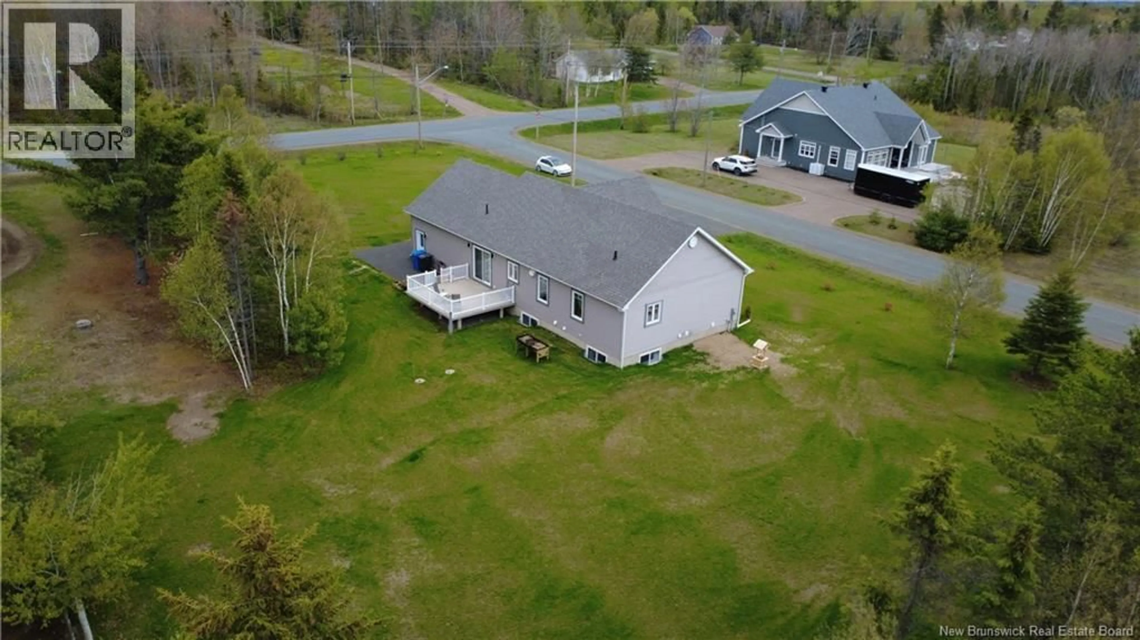 A pic from outside/outdoor area/front of a property/back of a property/a pic from drone, unknown for 15 RUE GIROUARD, Saumarez New Brunswick E1X3K2