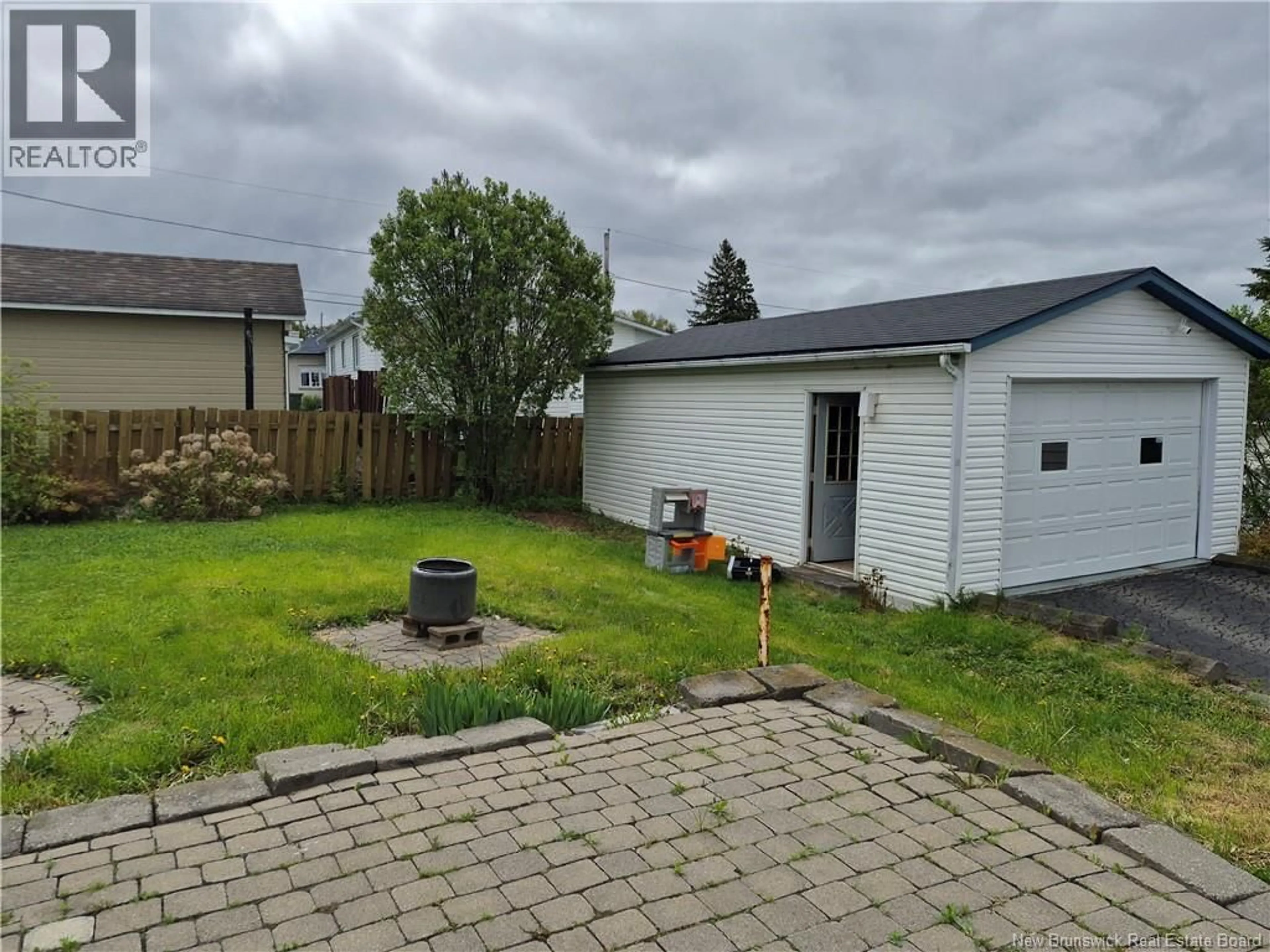 A pic from outside/outdoor area/front of a property/back of a property/a pic from drone, street for 115 46TH AVE, Edmundston New Brunswick E3V3B7