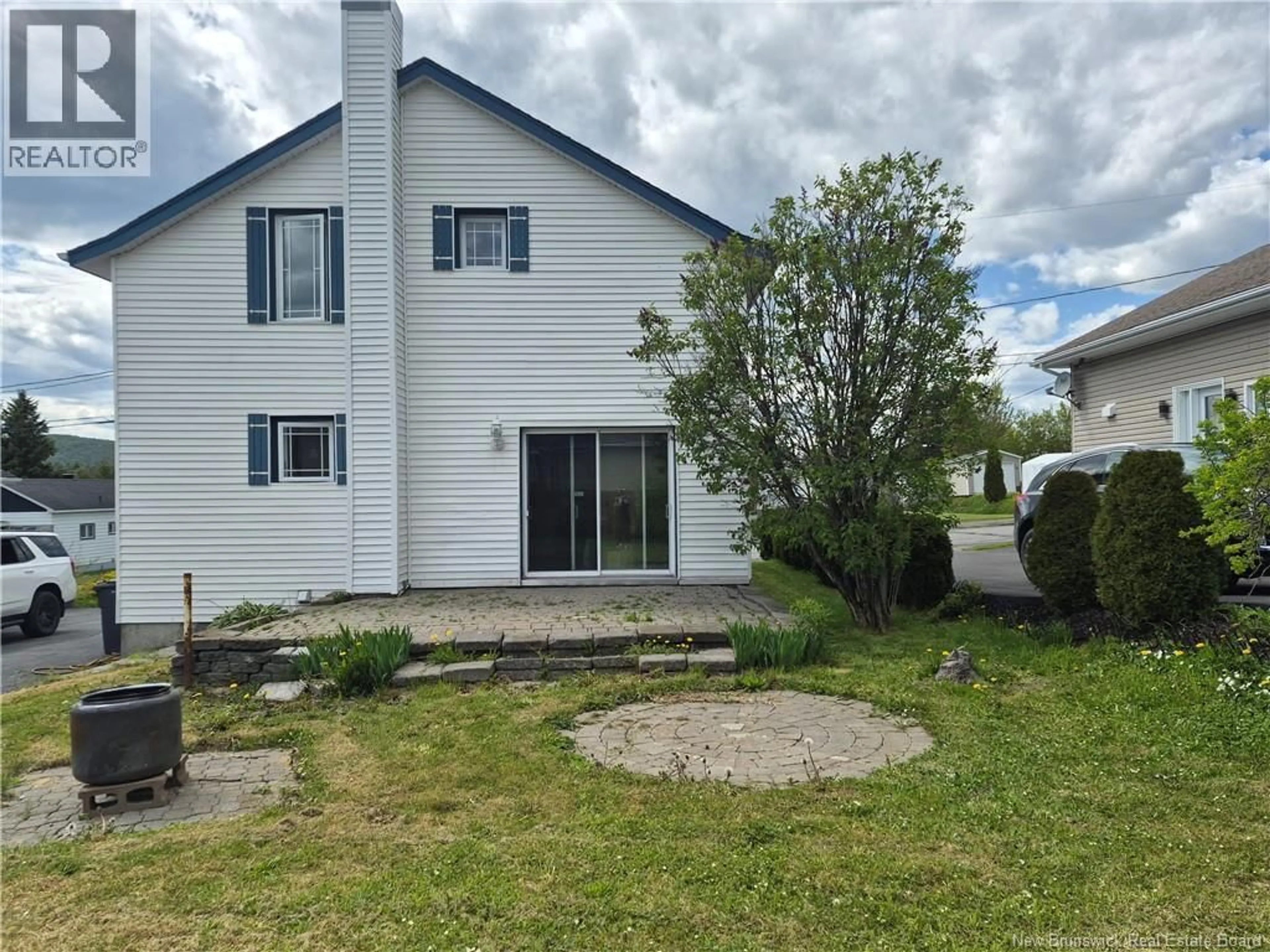 A pic from outside/outdoor area/front of a property/back of a property/a pic from drone, unknown for 115 46TH AVE, Edmundston New Brunswick E3V3B7