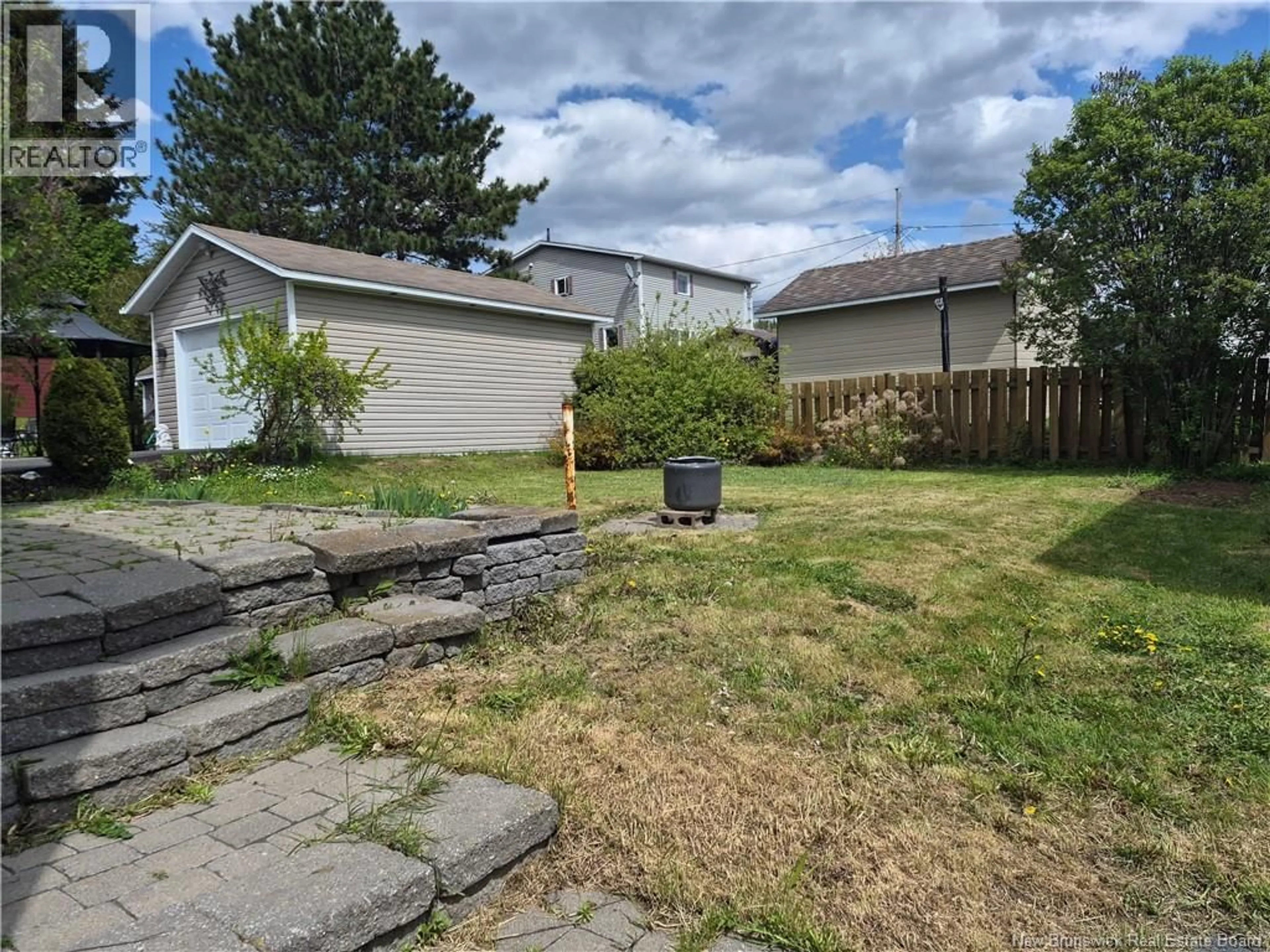 A pic from outside/outdoor area/front of a property/back of a property/a pic from drone, street for 115 46TH AVE, Edmundston New Brunswick E3V3B7