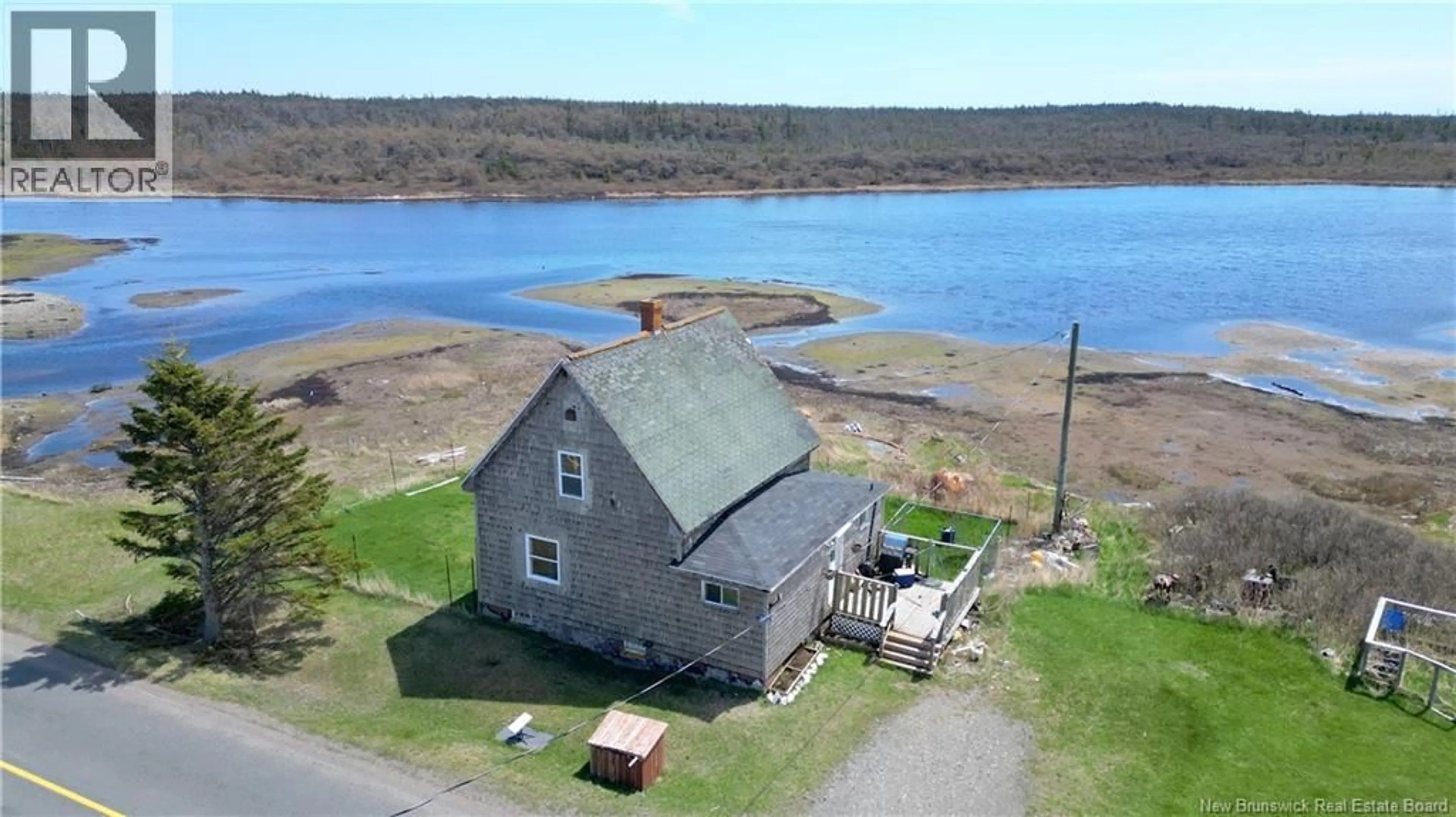 A pic from outside/outdoor area/front of a property/back of a property/a pic from drone, water/lake/river/ocean view for 202 WHITE HEAD ROAD, White Head Island New Brunswick E5G1K6