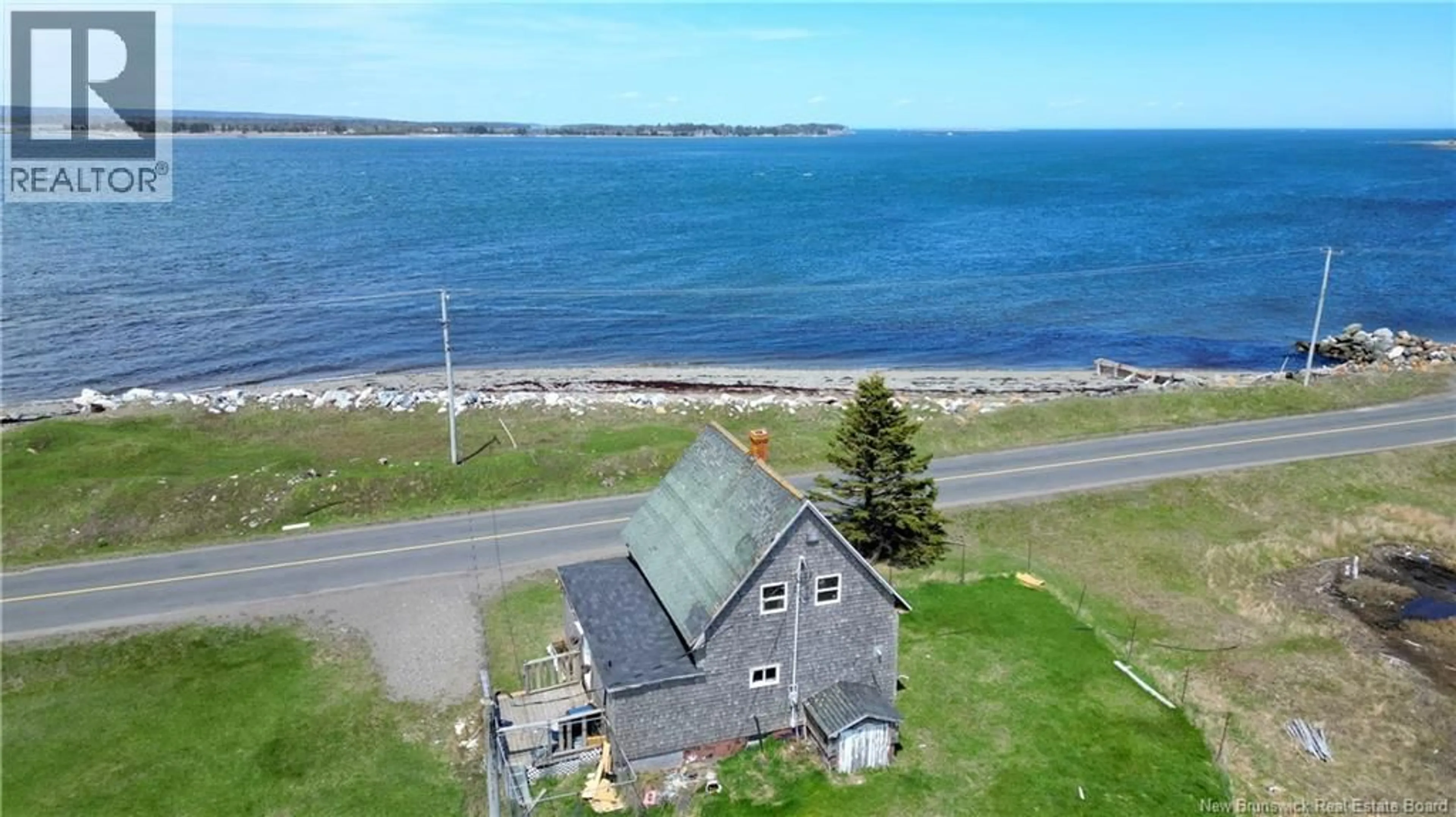 A pic from outside/outdoor area/front of a property/back of a property/a pic from drone, water/lake/river/ocean view for 202 WHITE HEAD ROAD, White Head Island New Brunswick E5G1K6