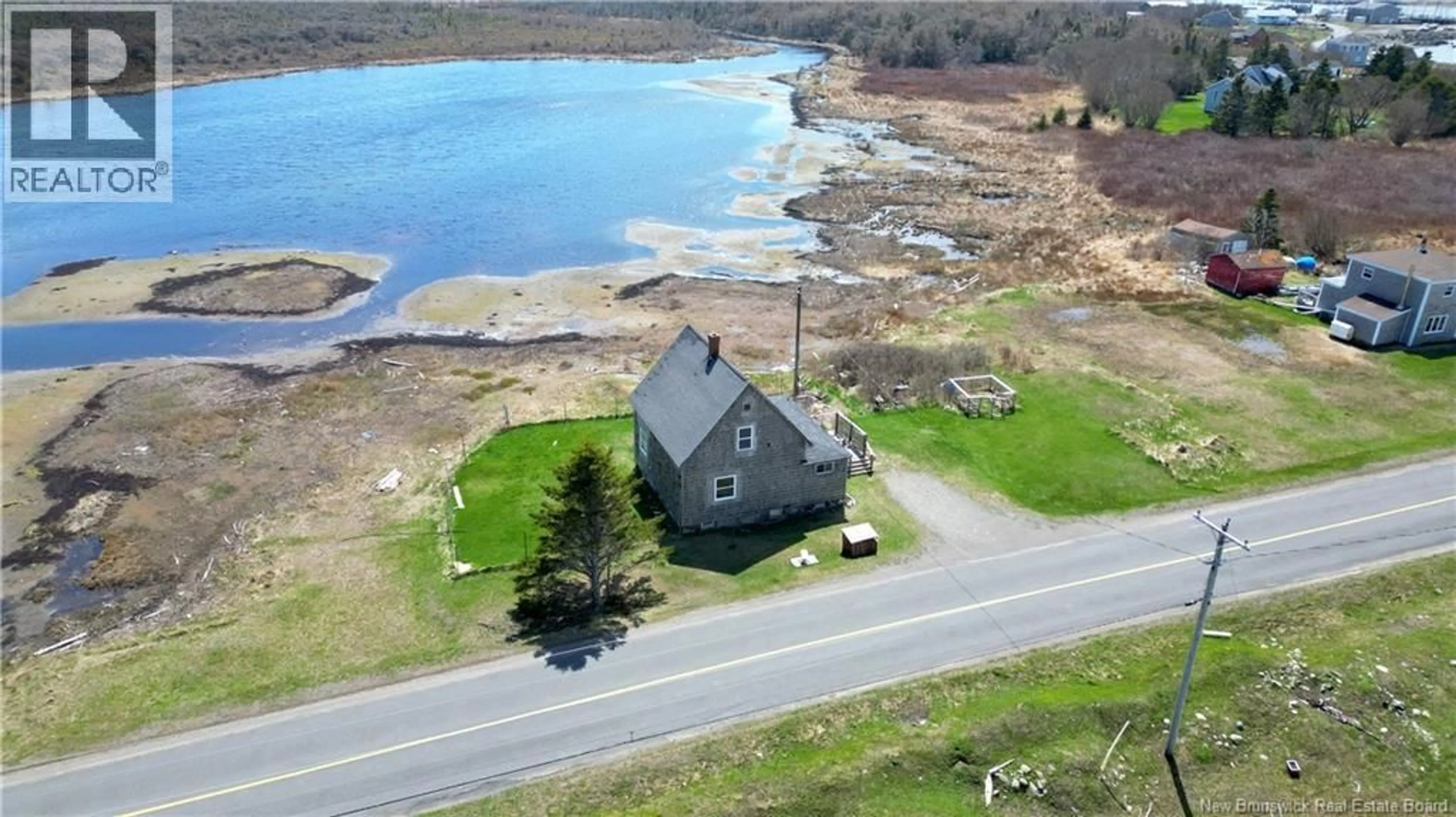 A pic from outside/outdoor area/front of a property/back of a property/a pic from drone, water/lake/river/ocean view for 202 WHITE HEAD ROAD, White Head Island New Brunswick E5G1K6