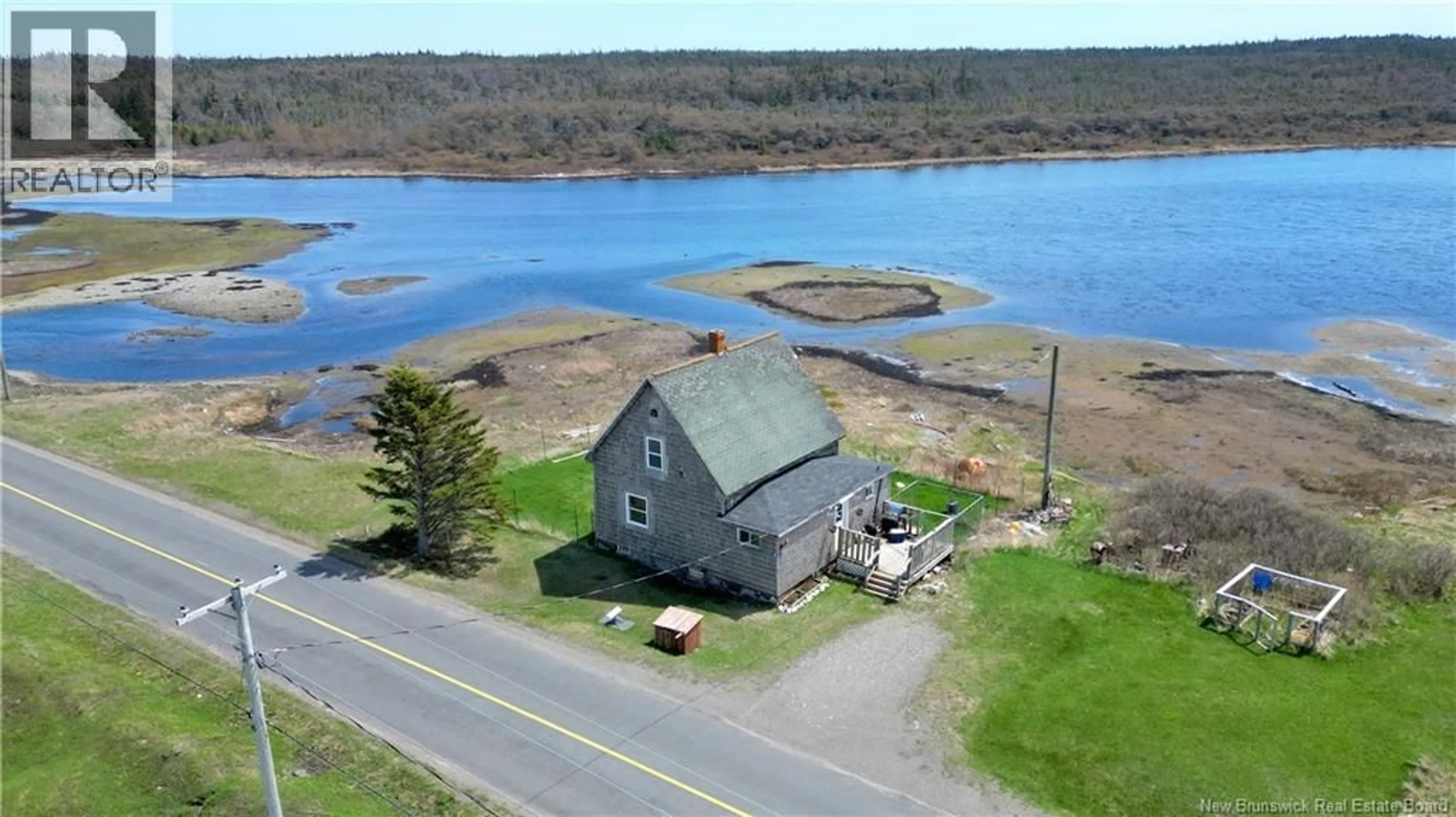 A pic from outside/outdoor area/front of a property/back of a property/a pic from drone, water/lake/river/ocean view for 202 WHITE HEAD ROAD, White Head Island New Brunswick E5G1K6