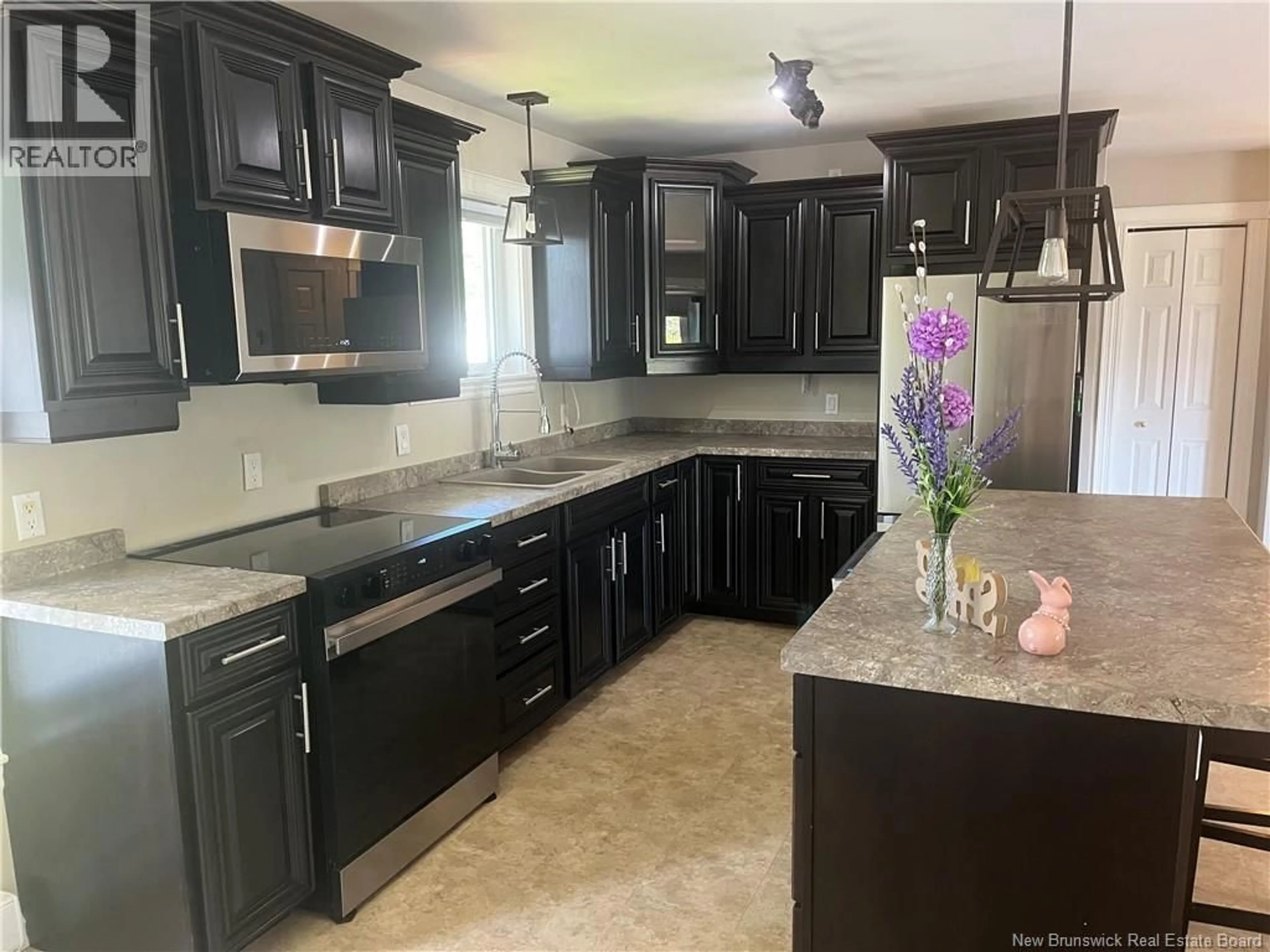 Open concept kitchen, ceramic/tile floor for 71 COLIN DRIVE, Miramichi New Brunswick E1V6B9