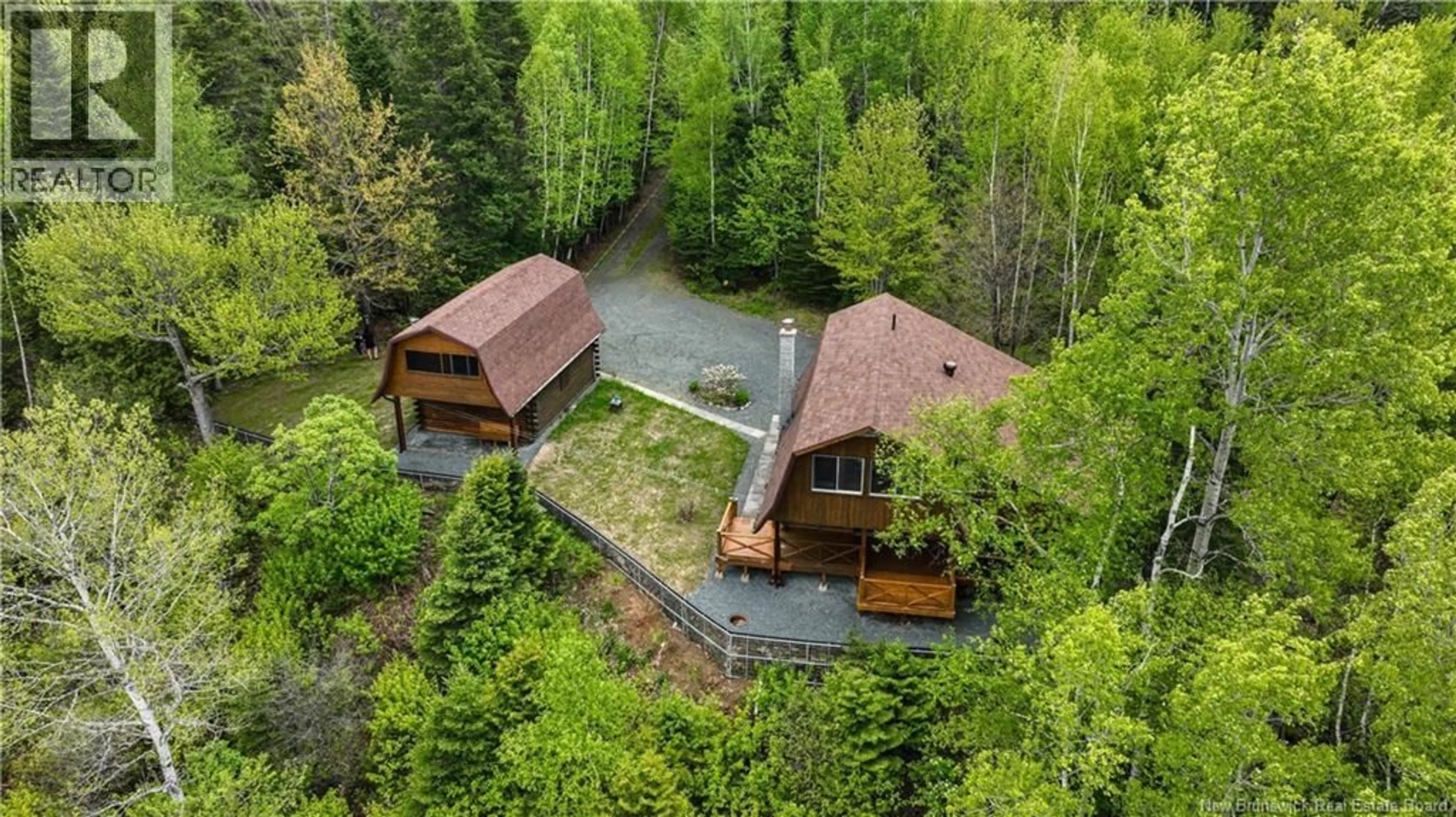 A pic from outside/outdoor area/front of a property/back of a property/a pic from drone, forest/trees view for 2337 RTE 118, McKinleyville New Brunswick E9E2H5