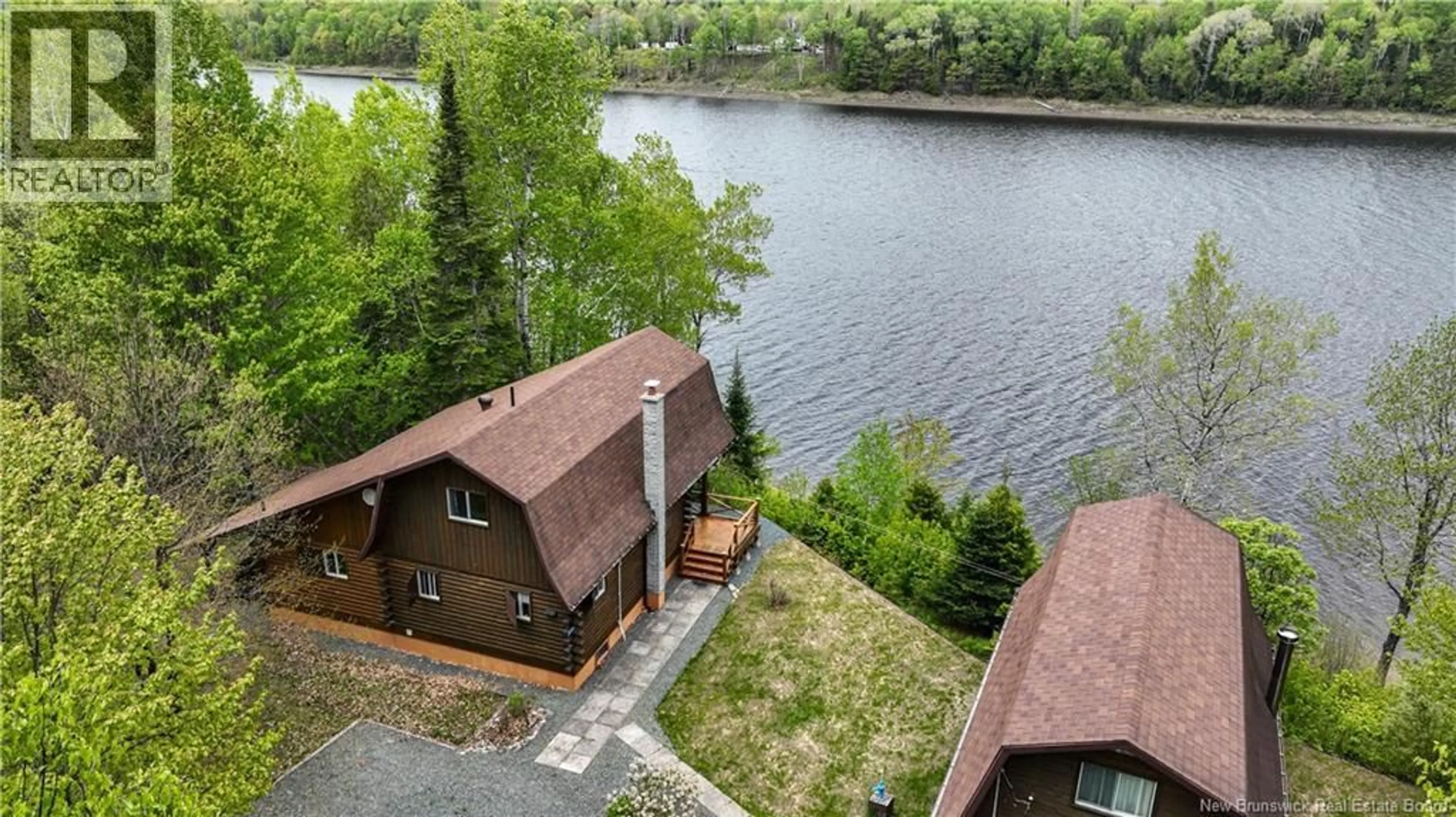 A pic from outside/outdoor area/front of a property/back of a property/a pic from drone, water/lake/river/ocean view for 2337 RTE 118, McKinleyville New Brunswick E9E2H5