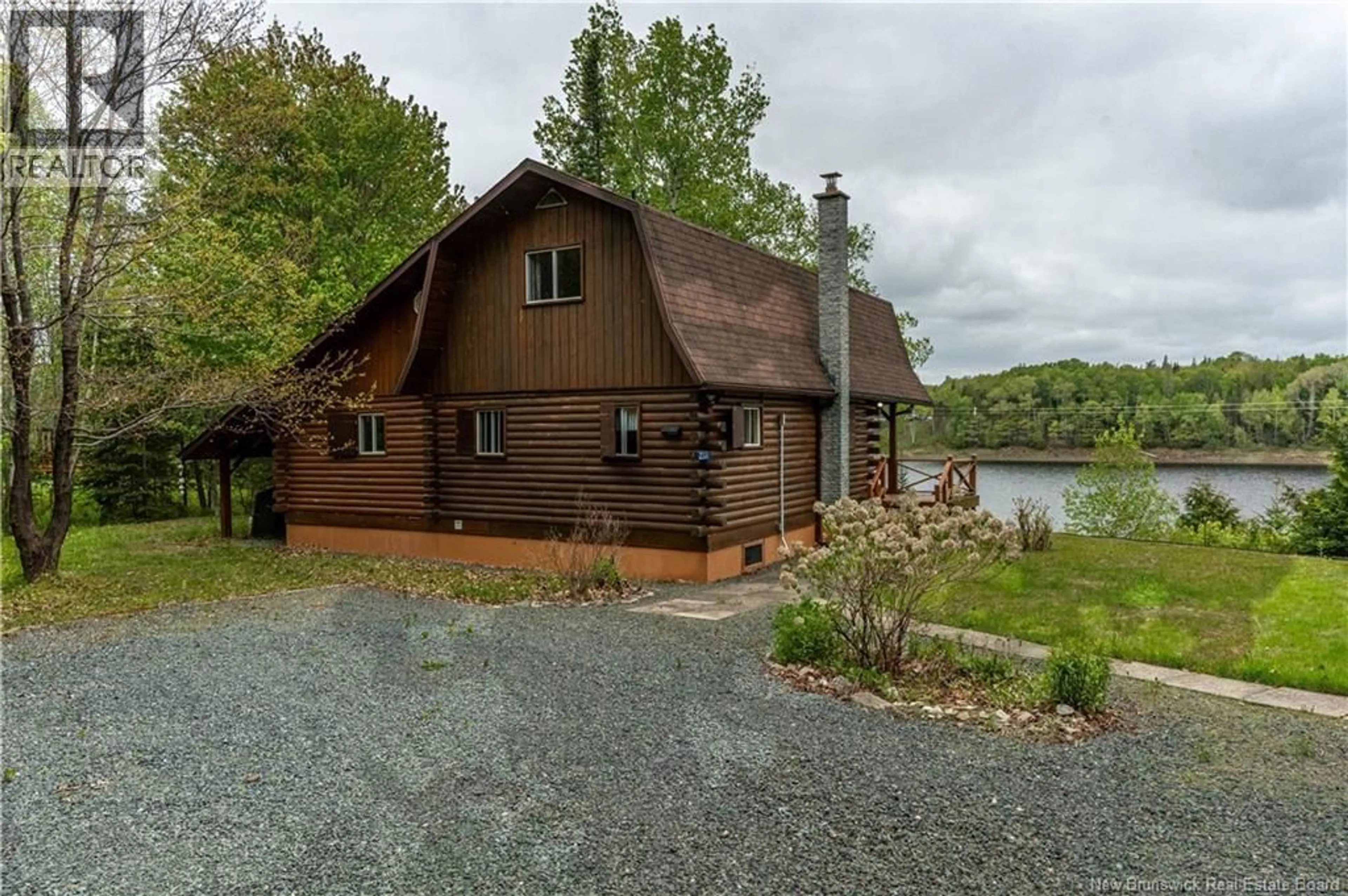 A pic from outside/outdoor area/front of a property/back of a property/a pic from drone, water/lake/river/ocean view for 2337 RTE 118, McKinleyville New Brunswick E9E2H5