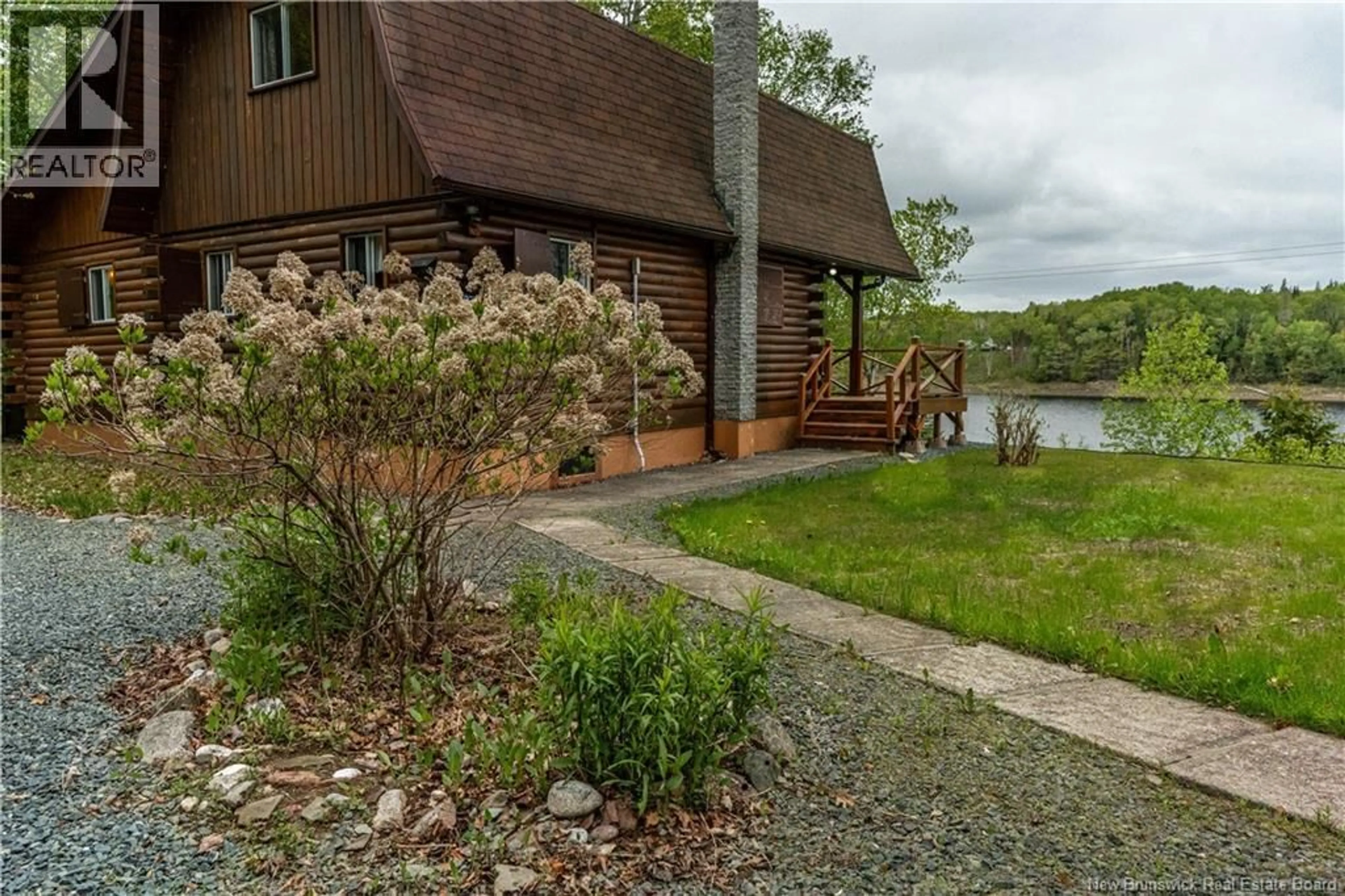 A pic from outside/outdoor area/front of a property/back of a property/a pic from drone, water/lake/river/ocean view for 2337 RTE 118, McKinleyville New Brunswick E9E2H5