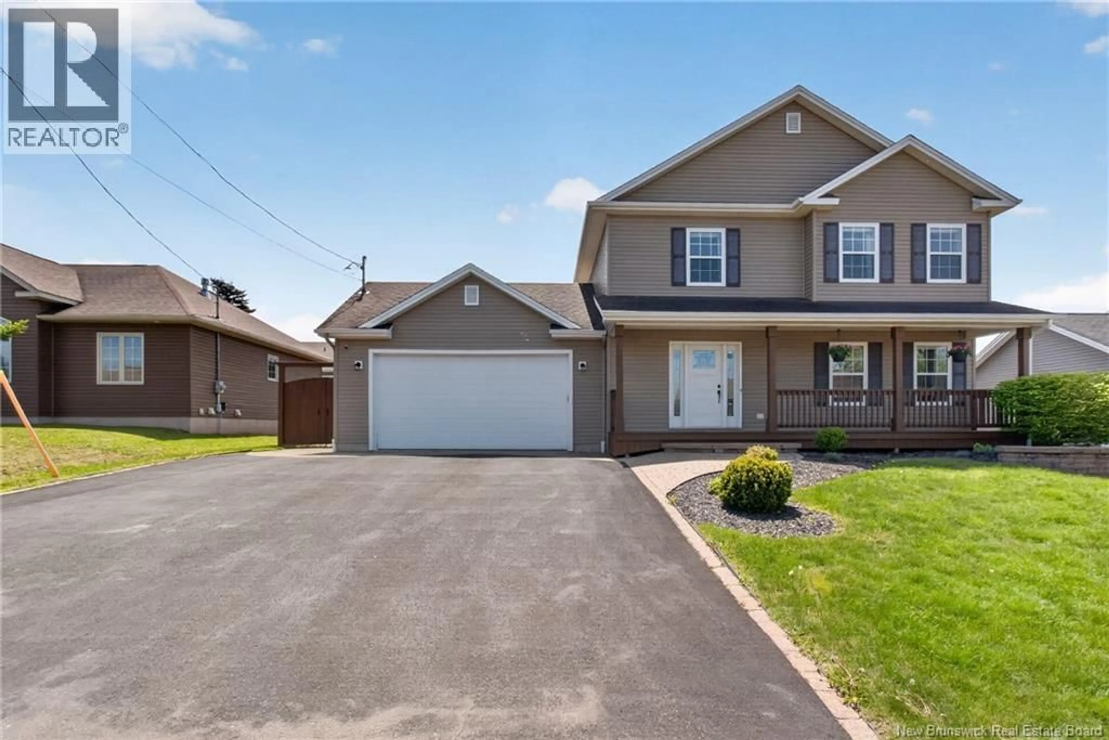 Home with vinyl exterior material, street for 35 DES AUBES STREET, Dieppe New Brunswick E1A9G2
