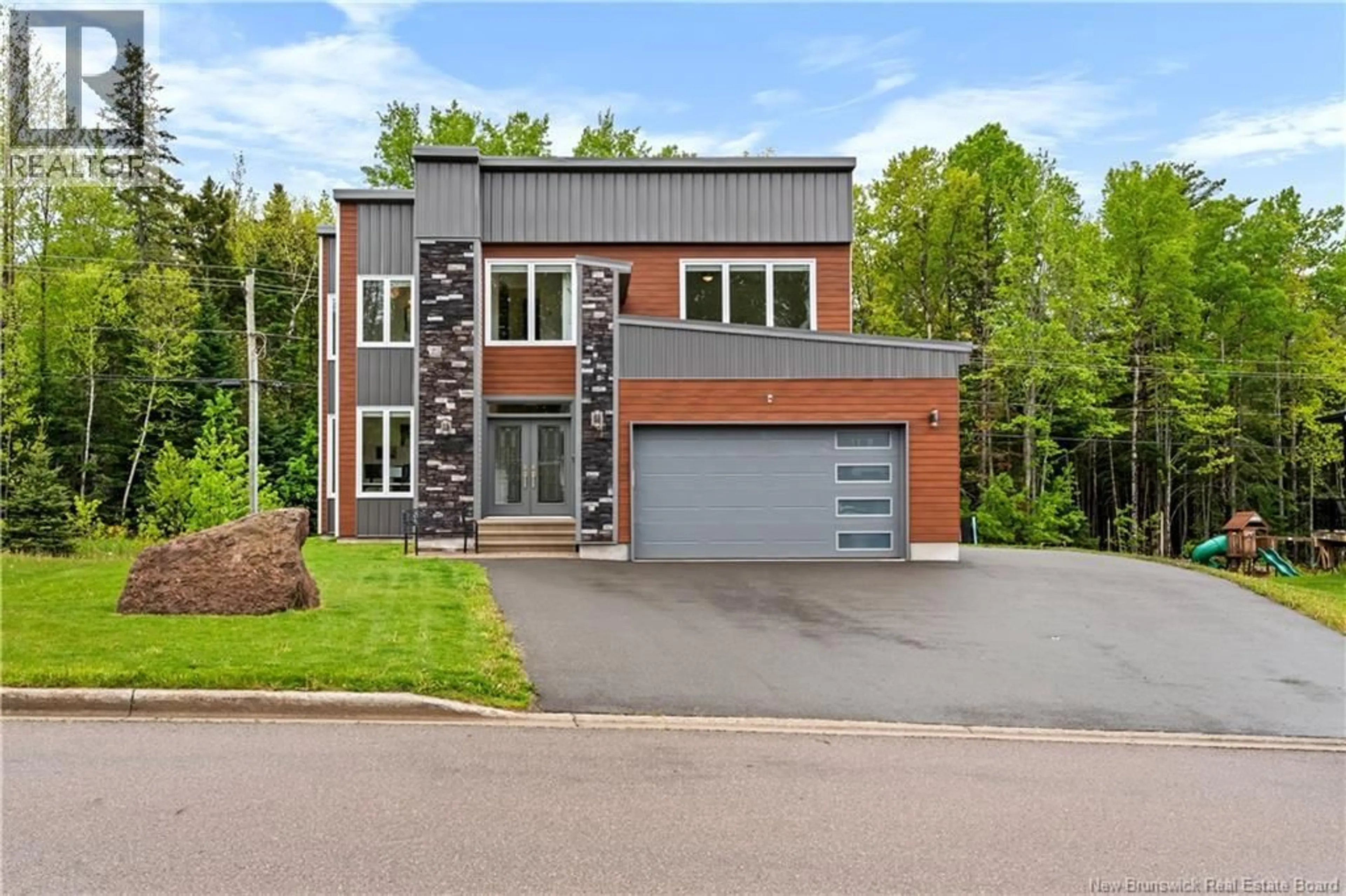 Home with brick exterior material, street for 16 PARKPLACE LANE, Moncton New Brunswick E1A9N2