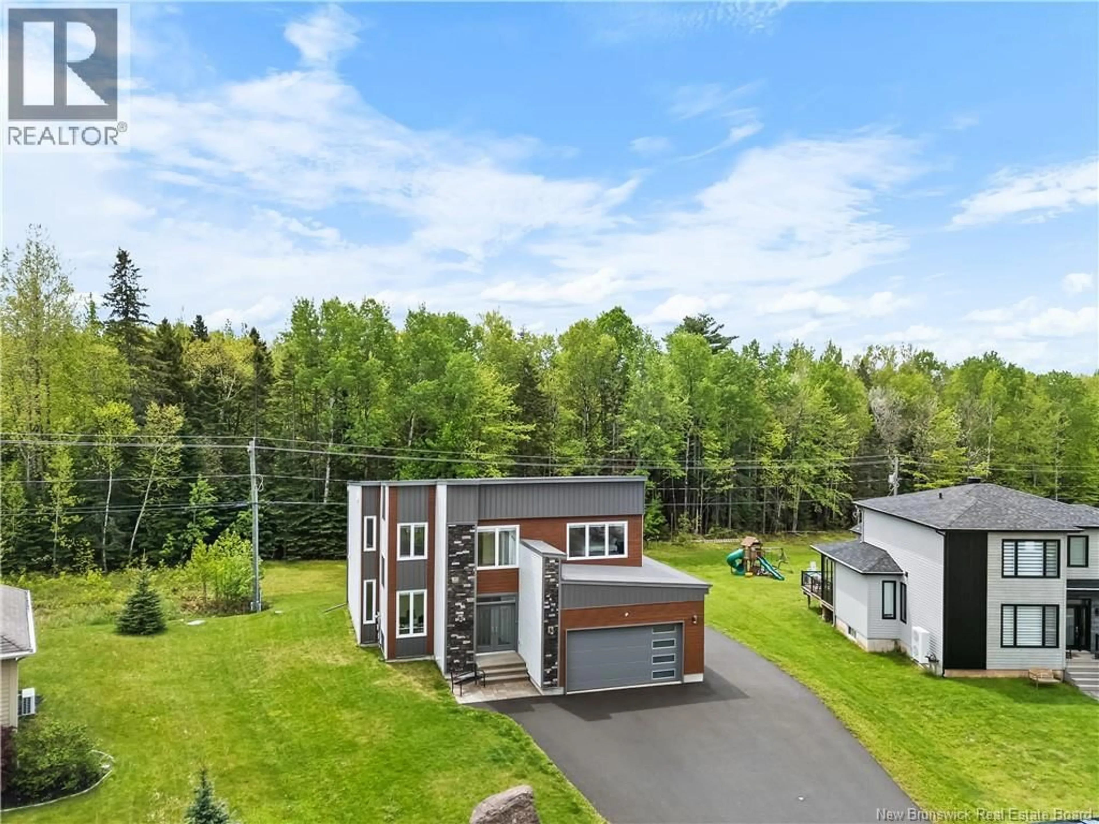 A pic from outside/outdoor area/front of a property/back of a property/a pic from drone, street for 16 PARKPLACE LANE, Moncton New Brunswick E1A9N2