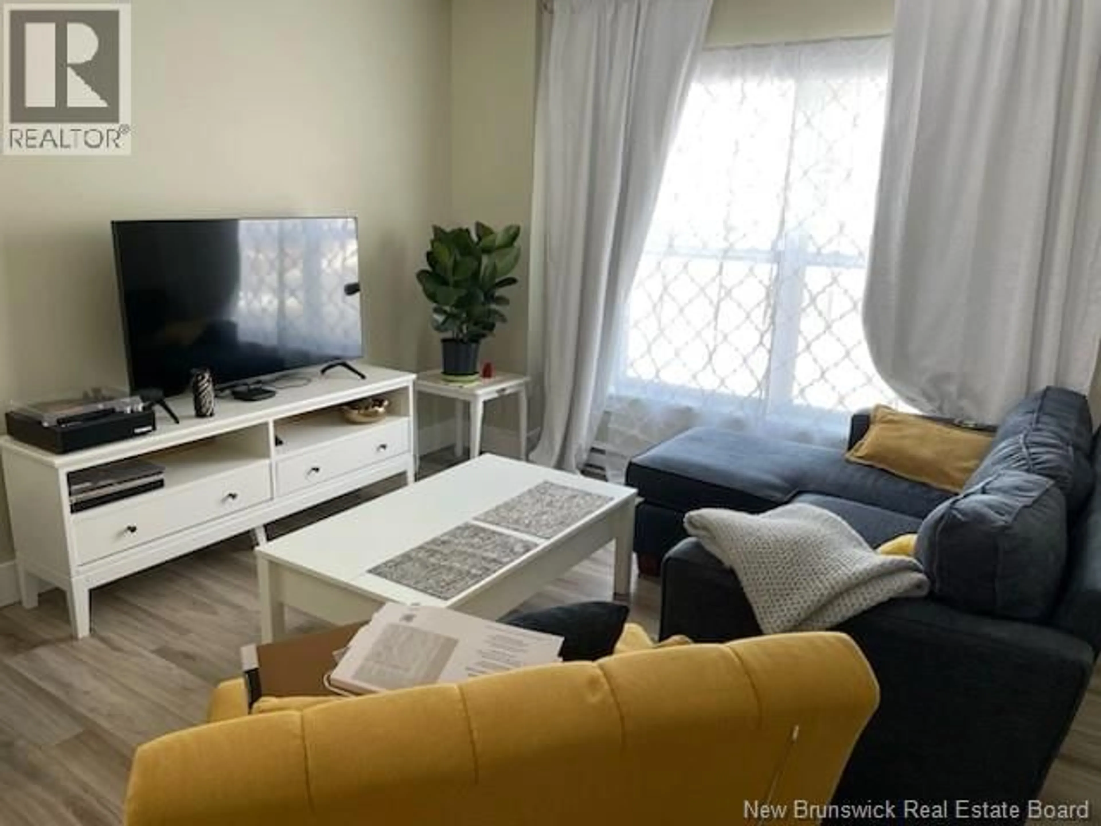 Living room with furniture, floor is not visible for 67 DEWITT ACRES, Fredericton New Brunswick E3A6S3