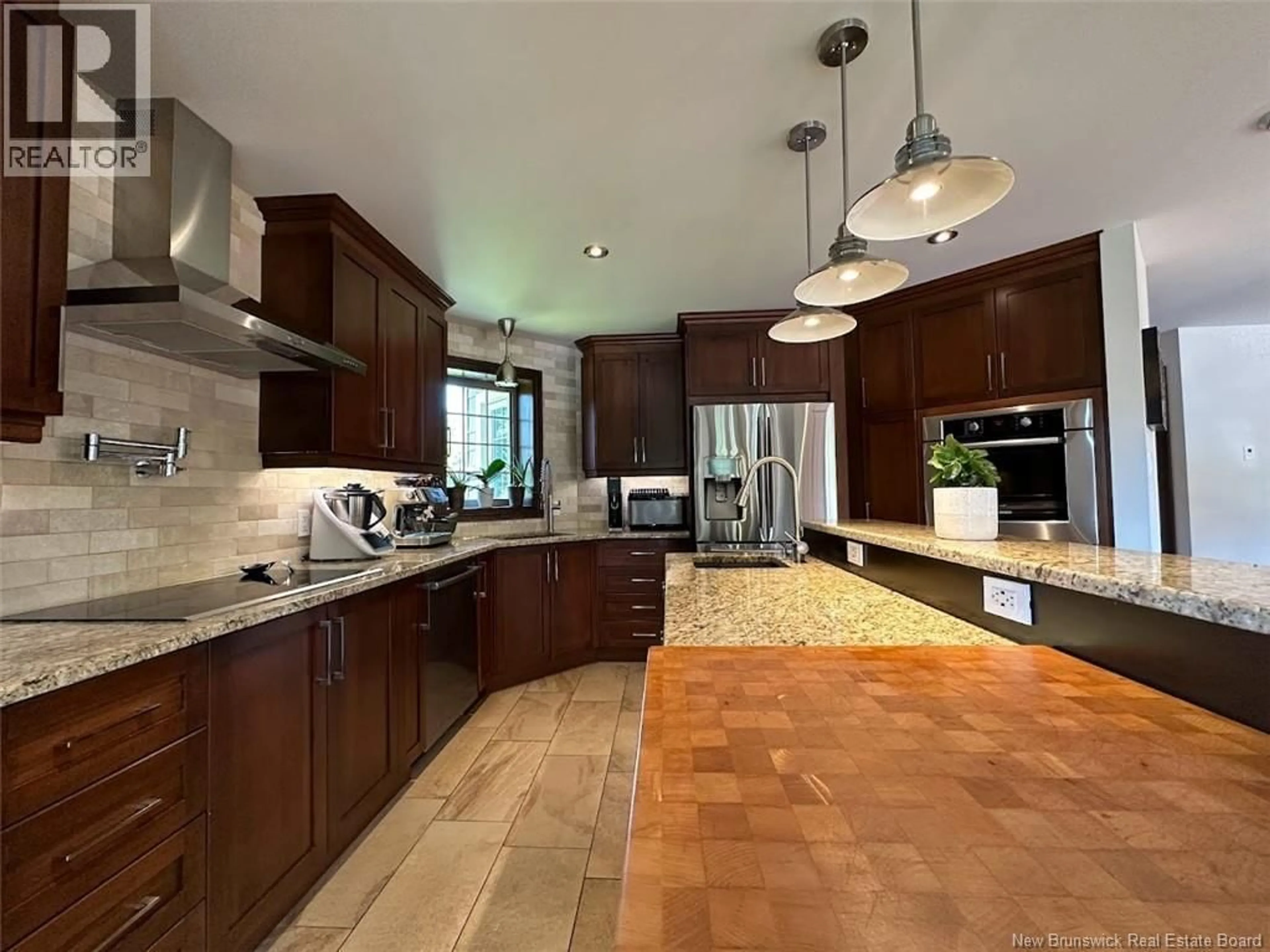 Open concept kitchen, ceramic/tile floor for 141 T. MORIN ROAD, Saint-Joseph-De-Madawaska New Brunswick E7B2T2
