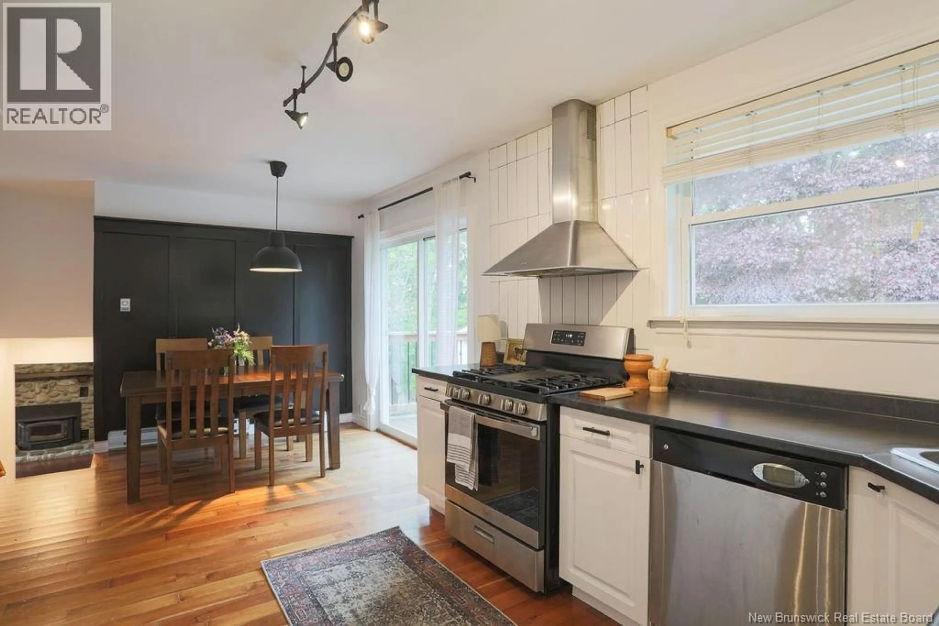 Open concept kitchen, wood/laminate floor for 11 KENNEVIEW DRIVE, Quispamsis New Brunswick E2E1A4
