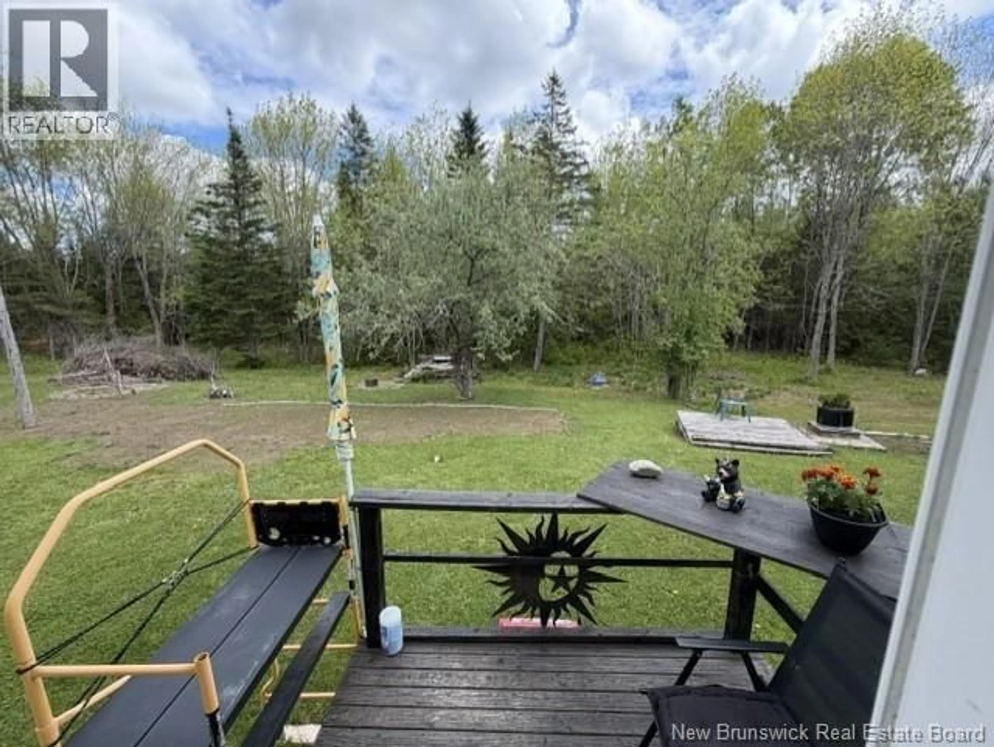 A pic from outside/outdoor area/front of a property/back of a property/a pic from drone, forest/trees view for 7825 ROUTE 3, Dewolfe New Brunswick E5A1K8