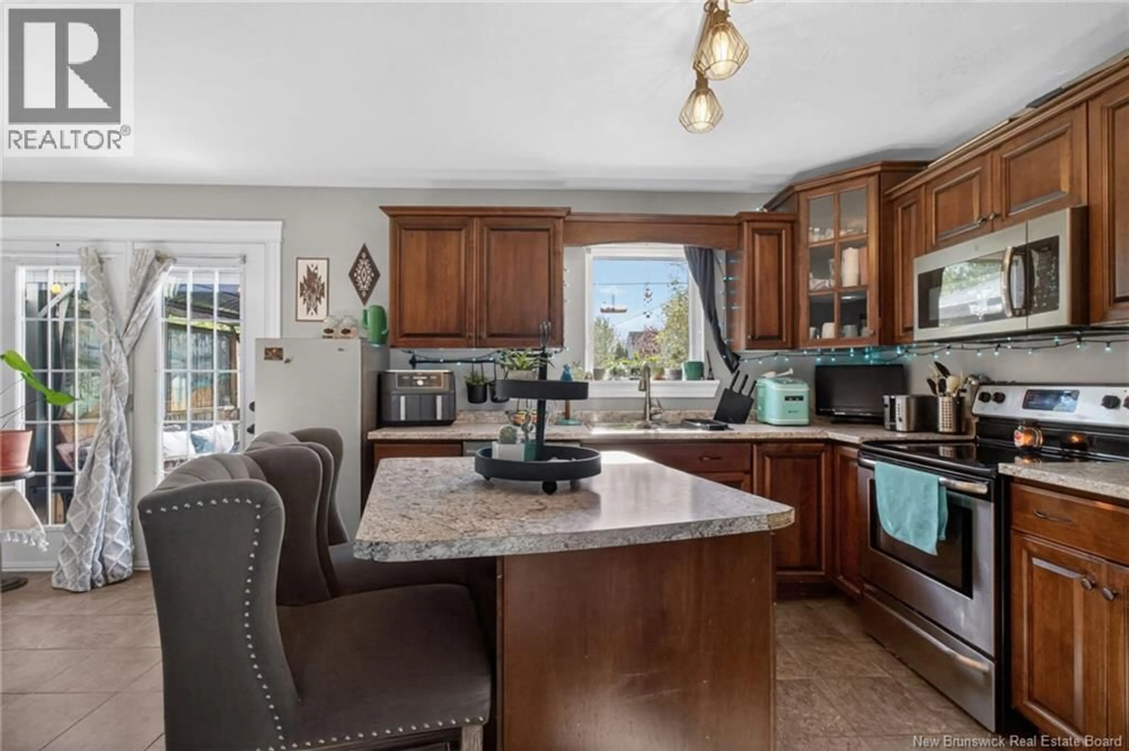 Open concept kitchen, ceramic/tile floor for 19 NAPLES DRIVE, Moncton New Brunswick E1G0T5