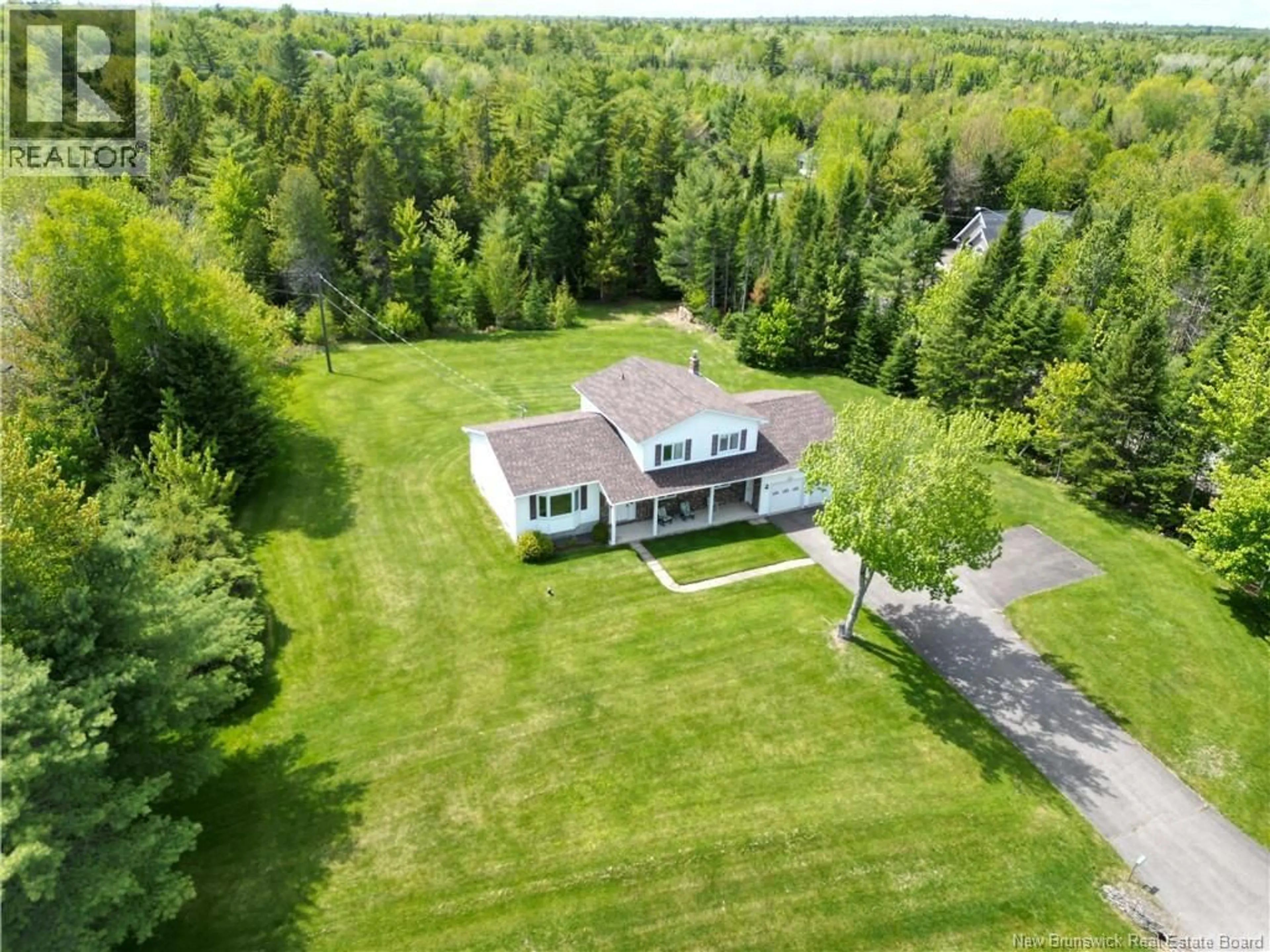 A pic from outside/outdoor area/front of a property/back of a property/a pic from drone, unknown for 68 SOMERSET DRIVE, Hanwell New Brunswick E3C1M8