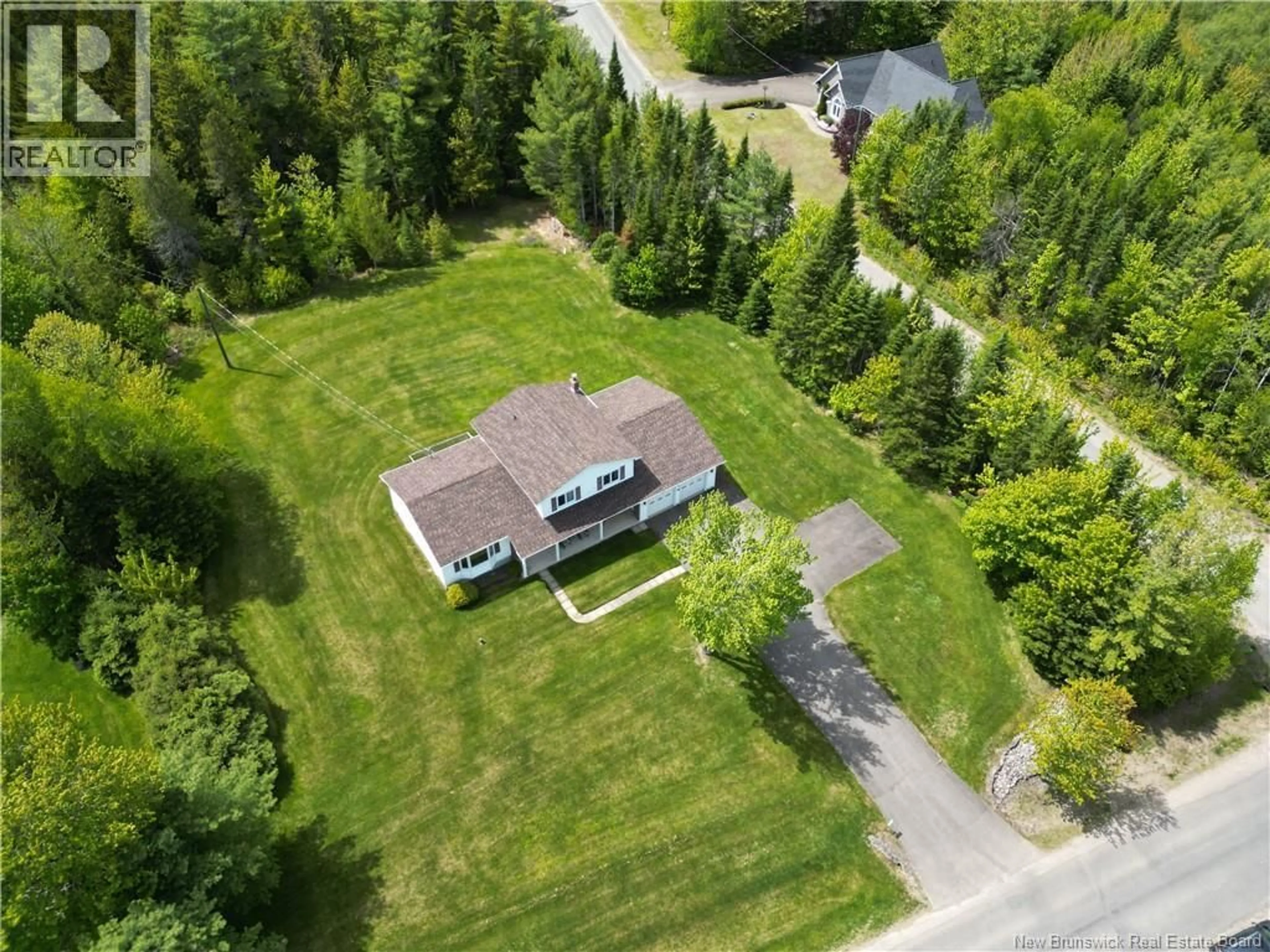 A pic from outside/outdoor area/front of a property/back of a property/a pic from drone, unknown for 68 SOMERSET DRIVE, Hanwell New Brunswick E3C1M8