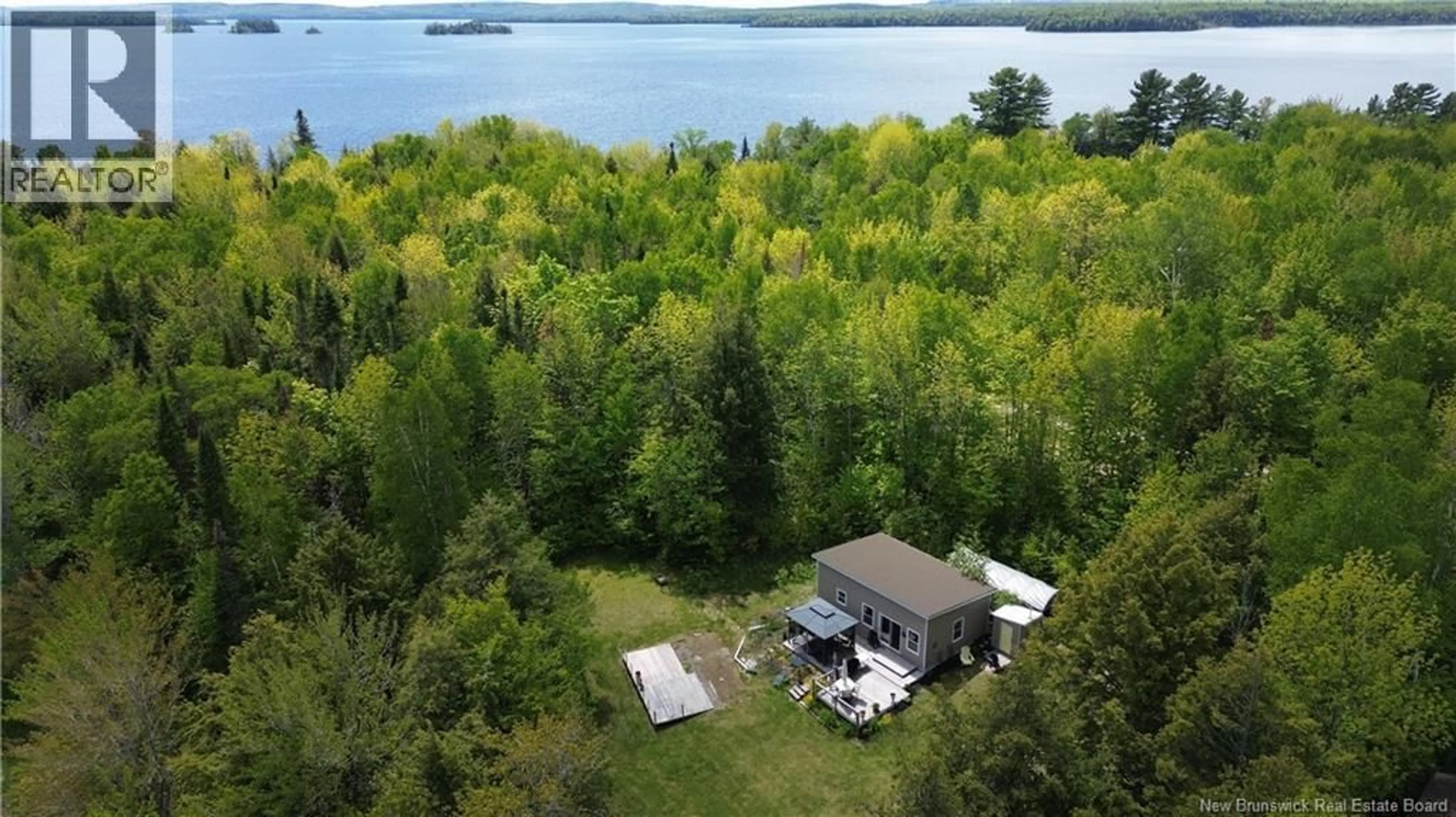 A pic from outside/outdoor area/front of a property/back of a property/a pic from drone, water/lake/river/ocean view for 55 STEVENSON LANE, Green Mountain New Brunswick E6H1Y6