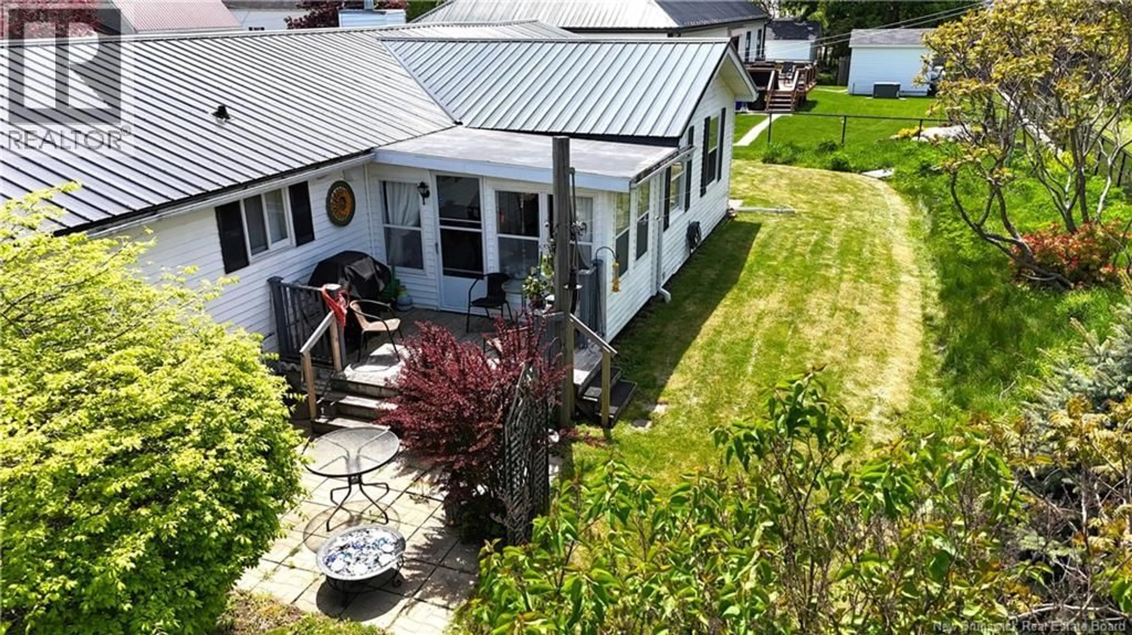 A pic from outside/outdoor area/front of a property/back of a property/a pic from drone, street for 122 ERNEST STREET, Saint Andrews New Brunswick E5B2E3