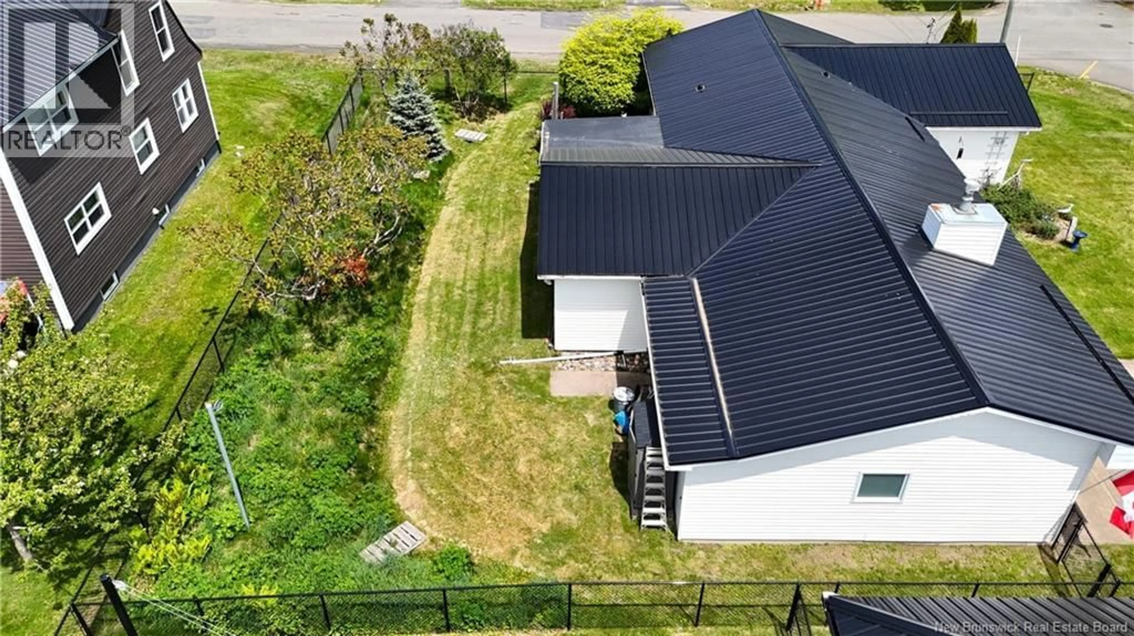 A pic from outside/outdoor area/front of a property/back of a property/a pic from drone, street for 122 ERNEST STREET, Saint Andrews New Brunswick E5B2E3
