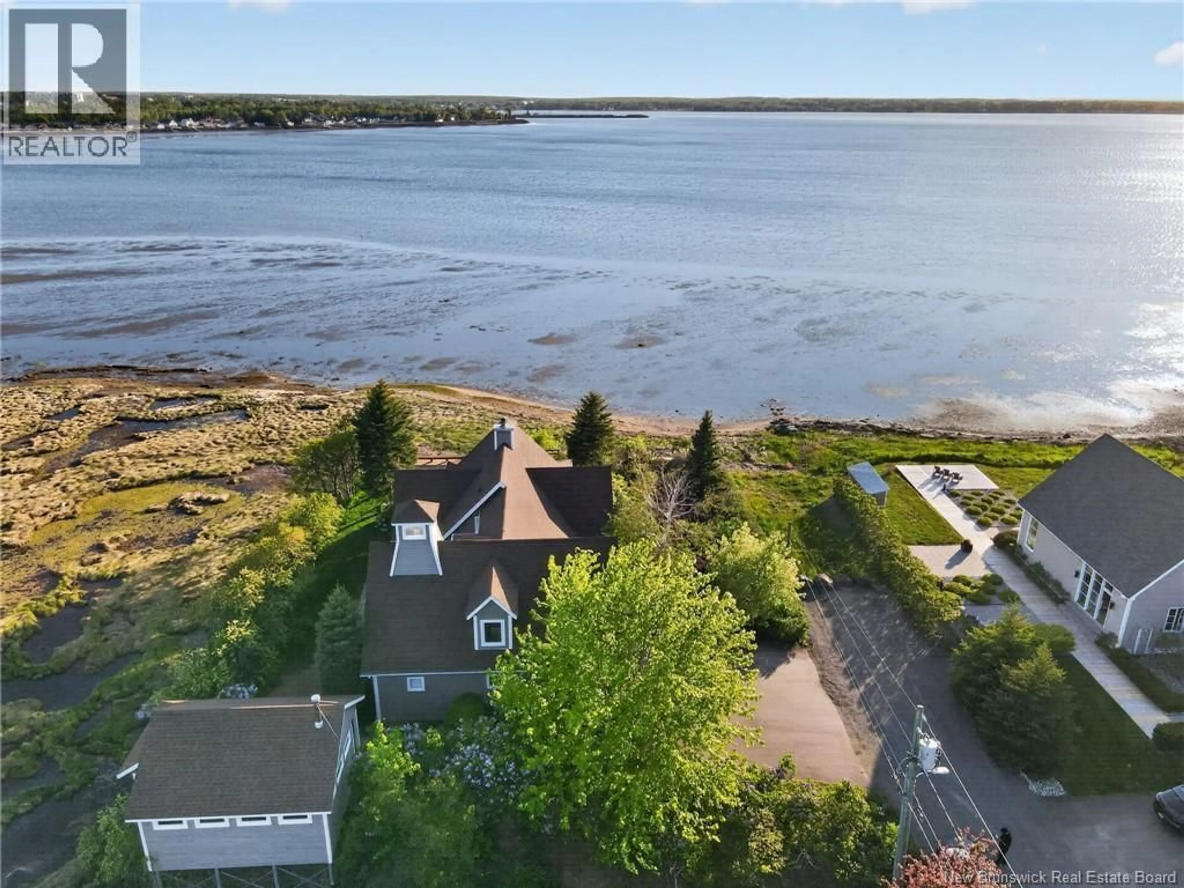 A pic from outside/outdoor area/front of a property/back of a property/a pic from drone, water/lake/river/ocean view for 28 SUNSET LANE, Pointe-Du-Chêne New Brunswick E4P5H3